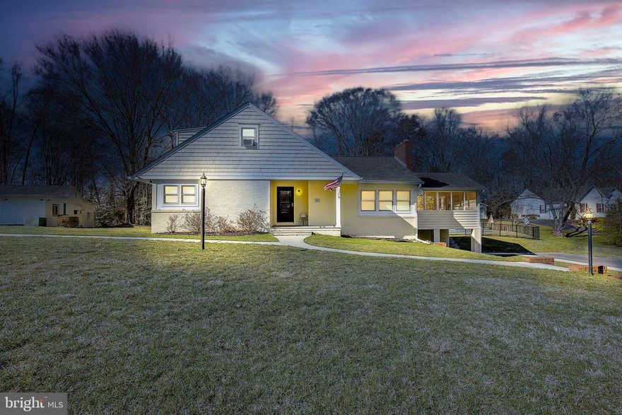 Welcome to your dream home nestled in the sought-after area of West Annapolis, where living a life of tranquility on a sprawling 1.6-acre lot. awaits This meticulously updated Cape Cod-style residence boasts a perfect blend of elegance and comfort. As you step inside, you'll be greeted by the warmth of rich wood floors that lead you into the inviting family room with detailed features such as shiplap walls, complete with a charming wood-burning fireplace. The kitchen, seamlessly connects to the family room and features white cabinets, granite tile countertops, and appliances including a double ovens. It's an entertainer's delight, flowing effortlessly into the dining area. Escape to the large enclosed porch, offering panoramic views of the lush yard and the pool, creating an setting for relaxation and outdoor gatherings. The main level offers a serene retreat in the form of the primary bedroom, featuring a walk-in closet to envy, a charming wood ceiling, and a luxurious upgraded ensuite bathroom. An additional bedroom on this level provides versatility and comfort, while the remodeled guest bathroom adds a touch of sophistication. Venture upstairs to discover two more generously sized bedrooms and another full bathroom, ensuring ample space for family and guests. The lower level beckons with a cozy recreation room boasting yet another wood-burning fireplace, along with a newly updated full bathroom and a convenient craft/workshop area. Outside, the detached garage houses a delightful guest house with its own bedroom, living room, kitchen, dining area, and bathroom, offering the perfect retreat for in-laws, au pairs, or visiting guests. The newly relined, heated pool sets the stage for endless entertainment, while the firepit, decks, new retractable awing, and outdoor living spaces create a haven for socializing and making memories. Completing this picture-perfect residence is the newly installed circular driveway, providing ample parking for all your family and guests. Don't miss this rare opportunity to own a private oasis just moments away from all the attractions of Annapolis. Seize the chance to live the lifestyle you've always dreamed of!