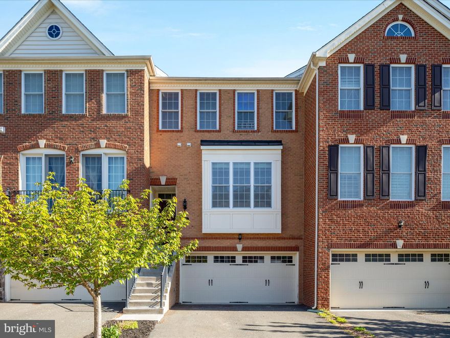 Welcome home to 302 Addivon Terrace!  This lovely brick townhome is perfectly located in the sought after community of Purcellville Green, walking distance to downtown Purcellville and convenient to everything.  This spacious home boasts beautiful millwork, fresh paint and flooring, a gourmet kitchen with all the upgrades, and a great layout.  A generous deck and fully fenced rear yard offer plenty of outdoor living space.  The welcoming entry opens to the beautiful formal living and dining areas, which connect to the gorgeous kitchen and an additional seating/dining space.  The upper level has three great bedrooms with volume ceilings, two full bathrooms, and a convenient laundry space.  The finished lower level provides a fantastic flex space, another full bathroom, and a walkout to the yard.  This one has it all!