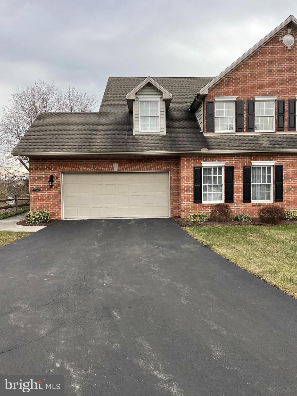 Great Cul-de-Sac Location in Whelan Crossing!    This light and bright end unit townhome features a 2 car garage, open floor plan, 1st floor primary suite, vaulted ceilings with skylights, and all hardwood floors on main level.  Family/Dining Room has a gas fireplace and a sliding glass door leading to a spacious deck with privacy fence.  The kitchen features beautiful  42" cherry cabinets, granite counter tops, ceramic tile backsplash, and stainless steel appliances.  The second floor has 2 bedrooms with walk-in closets, a huge hall closet and a full bath.   The large walk-out unfinished basement with a sliding glass door leads to a patio.  Plenty of room to finish for additional living space.  Great views from the deck!   Less than 5 minutes to Major Highways, Grocery Stores and 2 Hospitals.     *Seller is a Licensed Realtor in PA*