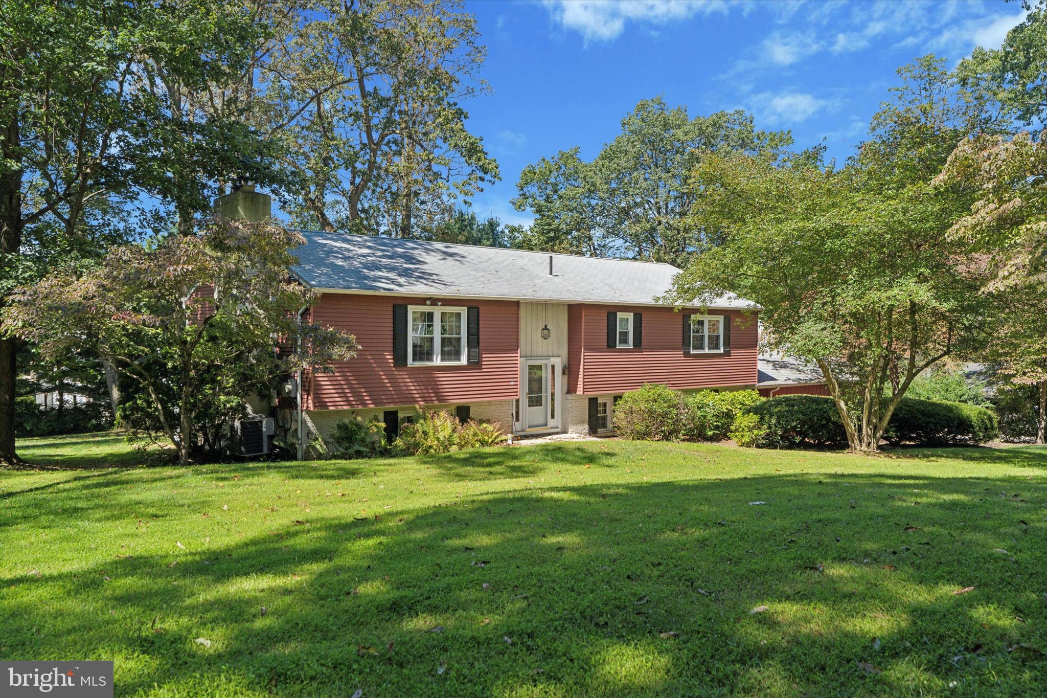 Welcome to this well-maintained bi-level home, proudly offered for the first time by its original owners. Thoughtfully designed and custom-built, this residence combines space, warmth, and flexibility on a scenic one-acre lot in West Caln Township, Chester County.
Inside, the home features two generous living areas, each with a wood-burning fireplace. The upper-level living room offers built-in shelving and hardwood flooring, and sits adjacent to a spacious, open kitchen—ideal for both everyday living and entertaining. The kitchen includes ample workspace and opens through sliding glass doors to a rear deck with tranquil views of the backyard.
Upstairs, you'll find three comfortable bedrooms and two full bathrooms. The lower level offers additional living space with direct access to the rear yard, as well as a complete in-law suite with its own private entrance. The suite features a full kitchen, living room, bedroom, and bathroom—ideal for multi-generational living, guests, or a private home office. Additionally, there is a bonus room on the lower level that can serve as a fourth bedroom, office, craft room, or flex space to suit your needs.
A standout feature of the property is the oversized three-car attached garage, ideal for car enthusiasts, hobbyists, or anyone in need of substantial storage. Whether you're storing tools, outdoor equipment, or a collection of vehicles, this garage offers exceptional functionality.
Additional highlights include a peaceful setting with ample outdoor space, and a shared driveway with just two neighboring homes, offering both privacy and a sense of community on quiet Kibler Lane.
This home presents a rare opportunity to enjoy quiet country living with convenient access to shopping, dining, and major commuter routes.