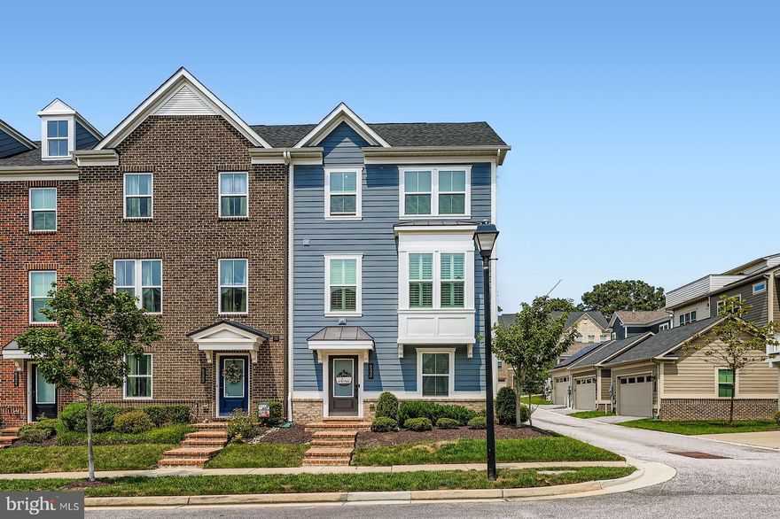 Welcome to 6220 Islington St – where luxury living meets effortless style in the heart of the vibrant Greenleigh at Crossroads community! This end-unit Strauss model is the largest and most desirable layout in the neighborhood—boasting 4 spacious bedrooms, 3.5 bathrooms, a 2-car garage, and over 2,100+ square feet of thoughtfully designed living space across three light-filled levels.

Step inside to discover a rare above-ground entry-level basement that doesn’t feel like a basement at all. Bright, open, and versatile—this space features a full ensuite bedroom and bathroom, making it perfect for overnight guests, a home office, or a private retreat for multigenerational living. Two coat closets add storage ease, and interior access to the spacious 2-car garage ensures ultimate convenience.

Upstairs, prepare to fall in love with the stunning main level! The open-concept layout is bathed in natural light and dressed in sleek luxury vinyl plank flooring throughout. The gourmet kitchen is a true showstopper—featuring eye-catching dual-tone cabinets, a massive center island perfect for hosting, gleaming granite countertops, stainless steel appliances, a pantry for all your storage needs, and a cozy breakfast nook ideal for morning coffee or weekend brunches. The kitchen flows seamlessly into a generous dining room with direct access to your private deck—an ideal spot to grill, dine al fresco, or simply unwind. A spacious living room offers the perfect backdrop for entertaining or movie nights, and the stylish half bath adds just the right touch for guests.

Retreat to the upper level where comfort and sophistication continue. The primary suite is a true sanctuary—featuring a large walk-in closet and a spa-inspired ensuite bathroom with dual vanity sinks, a soaking tub, and a separate glass-enclosed shower. Two additional sun-filled bedrooms and a full hallway bath offer space for family, guests, or your dream home office. A full-size laundry area on the bedroom level adds the finishing touch of everyday convenience.

As if the home itself wasn’t enough, you’ll love being part of the sought-after Greenleigh at Crossroads—an amenity-rich community designed for modern living. Enjoy access to a resort-style pool, state-of-the-art fitness center, clubhouse, walking and biking trails, dog parks, playgrounds, and green spaces. Plus, you're just steps from coffee shops, restaurants, and local boutiques—all with easy access to major commuter routes and just minutes from White Marsh, Towson, and downtown Baltimore.

This home truly has it all—luxury, location, lifestyle. Don’t miss your chance to make 6220 Islington St your forever home. Schedule your private tour today!