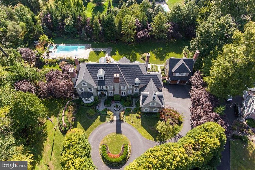 Welcome  to 785 Harrison Road - Now More than Ever, there is no place like Home & this Legacy Worthy Property is Truly A Family Compound and Vacation Home for the Ages!  It exemplifies impeccable design; every possible modern amenity with classic architectural detail and elements executed to perfection on a breathtaking private lot in one of Radnor Townships most coveted neighborhoods. The property was designed and built by two of our regions finest; Michael Visich Architect and Pohlig Builders. This collaboration combined with period sourced architectural treasures, and premier landscape design talent results in an irresistible Estate Property!  An impressive allee of trees lines the circular drive entry to the property that includes; the five Bedroom Main House and  one bedroom Guest House, 1+ acres of glorious, manicured grounds with resort quality outdoor living including a heated pool with waterfall feature, expansive flagstone terraces, two outdoor fireplaces and total privacy.  The Main House is a classic two story colonial with open floor plan, 10 foot ceilings on the first floor, beautiful millwork throughout and 5 fireplaces. The front to back grand center entrance hall opens to the formal living and dining rooms, and library - all with fireplaces and hardwood floors.  The  gourmet kitchen is beyond compare and features glazed brick walls, Kountry Kraft 42 inch custom cabinetry, a pair of 36  inch subzero refrigerators, Wolf Gas Fired 8 Burner Cooktop with copper hood, stainless steel island with freezer drawers, multiple appliances, two dishwashers, a large pantry closet, a light filled breakfast room that opens to the step down family room with fireplace, and built-ins.  The family entry/mud room includes an entrance to the 3-car attached garage, family half bath, closets, built-ins, laundry closet, and secondary staircase to the second floor and basement. The second floor includes a private master suite with fireplace, sitting area, built-in's, 2 walk-in custom closets, and sumptuous master bath. There are 4 other family bedrooms and 3 full baths, a play or computer room, full laundry, and walk up attic that could be finished for additional space. The 5th bedroom and playroom/computer room could serve as an au pair or home office suite. The basement is full and finished featuring a gym, family /media room with built-ins, half bath and unfinished storage areas. The guest house features a two car garage on the ground level, and a one bedroom suite on the second floor; a living room with a fireplace, built-ins, work station, wet bar, bedroom and full bath.  Notable recent improvements to the property include; new roof, new state of the art stucco system on all buildings, new generator, new furnaces and air-conditioning  in main house, first floor hardwood floors refinished, new pool heater, re-pointed flagstone patios and walkways.This special property meets today's evolving lifestyle standards in one of the most coveted and convenient Main Line Locations .   Highly ranked educational institutions, major commuting routes, Center City Philadelphia, Philadelphia International Airport and the town of Wayne are all minutes away. The Radnor Trail, and the town of Wayne, are an easy walk...Please see this stunning property in the 3D Matterport and Video Walk through attached. NOTE Tax Records Square Footage includes finished basement - per appraisal basement square footage is 2527 sq. ft.