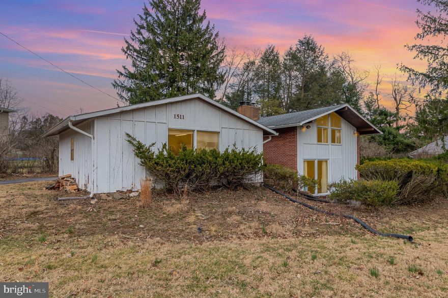 Welcome to this charming 3-bedroom, 1.5 bathroom bi-level home, perfectly situated on a .55 acre corner lot with a circular driveway for added convenience. This home offers plenty of space inside and out, featuring a screened porch, detached 2-car garage and a cozy fireplace in the main living area. The layout provides great potential with spacious bedrooms and ample natural light. While the home could use some updating, it's a fantastic opportunity to add your personal touch and create the home of your dreams. The large yard offers endless possibilities-gardens, outdoor entertainment, or expansion! This property is a rare find with great potential. Don't miss your chance-schedule a showing today!