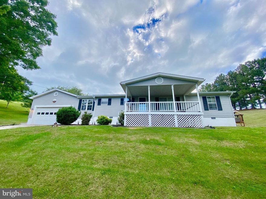 Back on the Market, No Fault of the Seller!  Welcome to this beautifully updated country home just minutes from Franklin, WV, where modern comfort meets peaceful seclusion. Situated on a scenic 1.52-acre lot with stunning views of the valley below, this recently remodeled property offers the best of rural living with convenient access to town. Inside, you'll find an upgraded kitchen, new flooring in the kitchen, dining area, and a bathroom, along with a brand-new HVAC system for year-round comfort. The oversized attached garage provides ample space for vehicles, storage, or hobbies, and there's an additional shed for even more flexibility. Whether you're relaxing outdoors, enjoying the quiet surroundings, or entertaining guests, this property offers a perfect blend of privacy, charm, and convenience. Don’t miss the chance to make this serene retreat your new home—contact us today to schedule a showing!