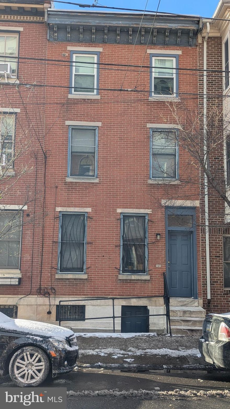 Rare investment opportunity in the Graduate Neighborhood! This legal quadplex with a garage and parking offers significant potential for owner-occupants and investors alike, with options for rental income, value-add improvements, or condo conversion. The property underwent a complete gut rehab in 1989 with modernized building systems and is situated on a street-to-street lot offering garage space and parking for two compact cars. Located steps from public transit and Center City amenities, the property boasts a Walk Score of 95, Transit Score of 97, and Bike Score of 87. Each unit features separate utilities (tenants pay except for water), central air and heat, dishwasher, garbage disposal, refrigerator, intercom, and recessed lighting. On-site coin-operated laundry generates additional revenue. The building consists of Unit 1: a 1-bedroom, 1-bath bilevel with a jetted tub and separate standup shower; Unit 2F and Unit 2R: studio apartments; and Unit 3: a 2-bedroom, 1-bath with wood and tile floors, large skylights, and all-new windows on the third floor. With a 99% occupancy rate over 24 years, this tenant-occupied property provides immediate income for the buyer. The garage/workshop is currently vacant, offering additional income potential. Current rents are below market value, presenting opportunities for rental increases and added property value. This is a true value-add opportunity with significant upside potential. The property is located near Rittenhouse Square, Center City business and retail districts, and South Street, with grocery stores, restaurants, and the Marian Anderson Recreation Center (featuring a public pool) all within walking distance. This quadplex qualifies for Fannie Mae/Freddie Mac’s new 5% down owner-occupied multifamily program and offers strong appreciation and rental growth potential. Whether you are looking to expand your portfolio, secure a cash-flowing asset, or explore condo conversion possibilities, this property has it all. Being sold AS-IS. Proof of funds or pre-approval required before scheduling showings. Owner is a licensed PA salesperson.