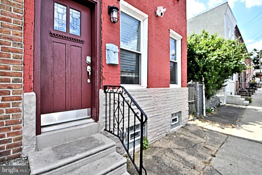 Totally rehabbed in 2021.  4 bedroom 2.5 bath end-unit row home in a growing area.  Brand new top of the line kitchen with granite counter tops, slow closing cabinets, stainless steel appliances, tile backsplash, marble floors.  Hardwood floors through second and third floors.  Brand new tile bathrooms.  Roof deck off the master bedroom.  Master bedroom with master bath with double vanity, stall shower, and soaking tub.  Freshly painted throughout.  new replacement windows.  New heating and air conditioning system.  new electrical wiring with 200 amp service.