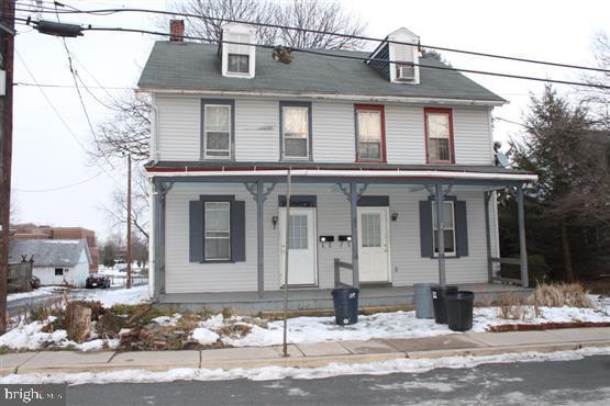 Nice two-unit with good cash flow. One newer heating system. Adjacent to campus.