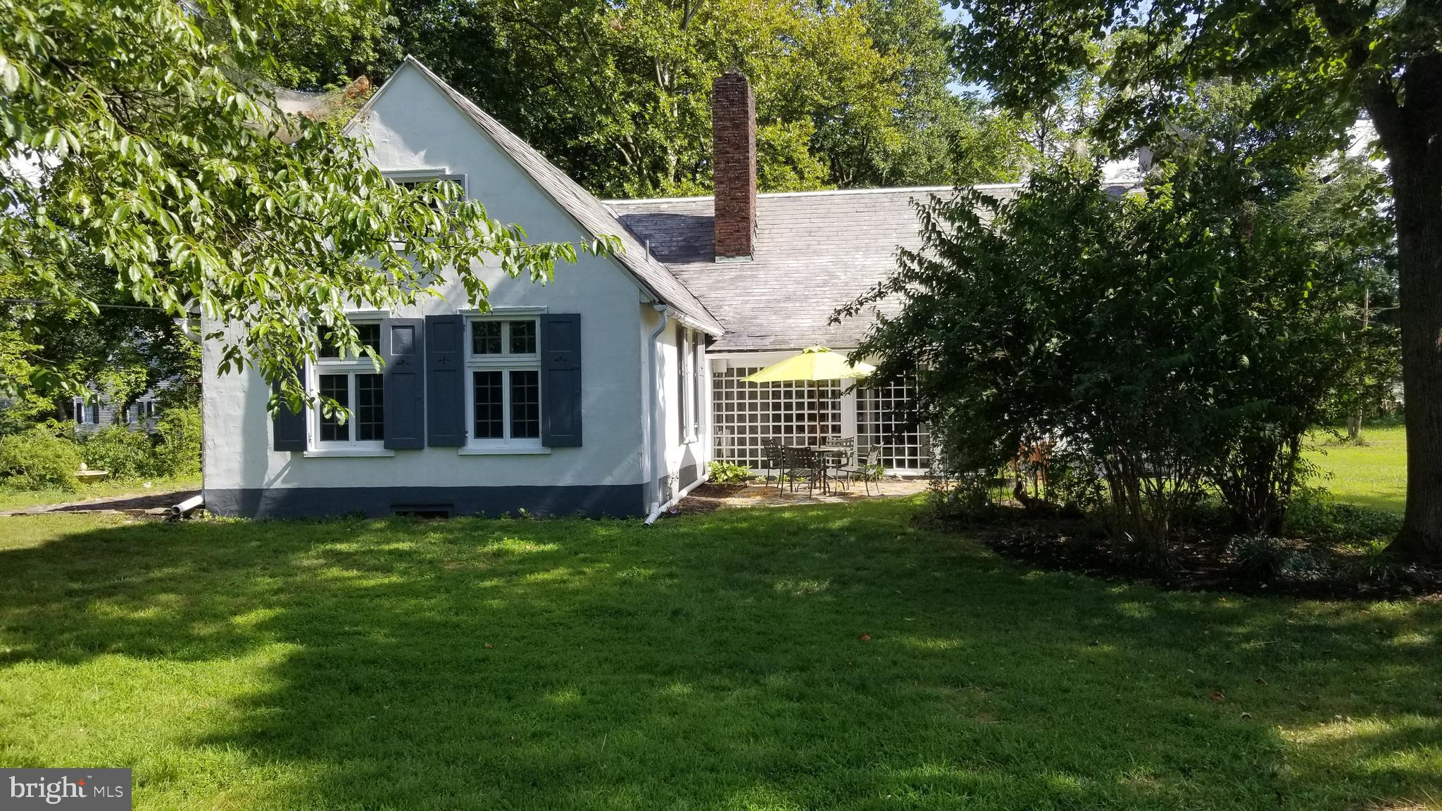 Tucked away in a secret magical setting on 1.5 acres is this charming and romantic cottage with French doors opening out onto the Delaware Canal with distant views of the Delaware River. During the mid 1900's, the children of the Pennsylvania Impressionists who lived and painted along the banks of the River, attended the Little French Kindergarten here. It was the children's favorite and welcoming stop for hot chocolate after skating on the frozen canal all day. The 3 bedroom, 2 1/2 bath cottage, renovated kitchen with all new appliances, large living room, study, and beautiful large windows creating sun-filled rooms throughout, is itself, an Andrew Wyeth painting. 1.5 miles north of downtown New Hope, or a 20-minute walk on the Canal towpath, to all the many shops and restaurants that New Hope and Lambertville have to offer.
