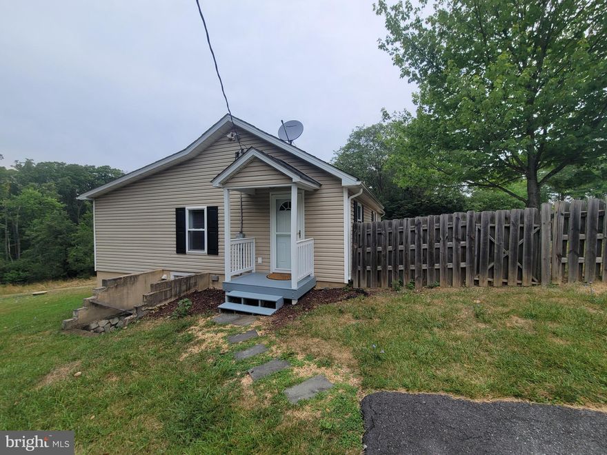 MUST have GOOD credit and references, no late payments, foreclosures, evictions, collections, etc, monthly income of at least 3X rent, no large or aggressive dog breeds, no pets under 1 yr of age, must be fixed. Beautiful rancher close to town. Three large bedrooms, living room with decorative fireplace and brand new flooring, kitchen with stainless appliances and small eat in area, and a wonderful fenced in yard in the front and lots of room to play in the back yard! Half bath in master bedroom and a walk in closet. Enjoy the country setting while being close to town! Pets case by case, tenant is responsible for mowing. Fantastic responsive landlord that appreciates excellent tenants! Non-refundable pet fee of $500.