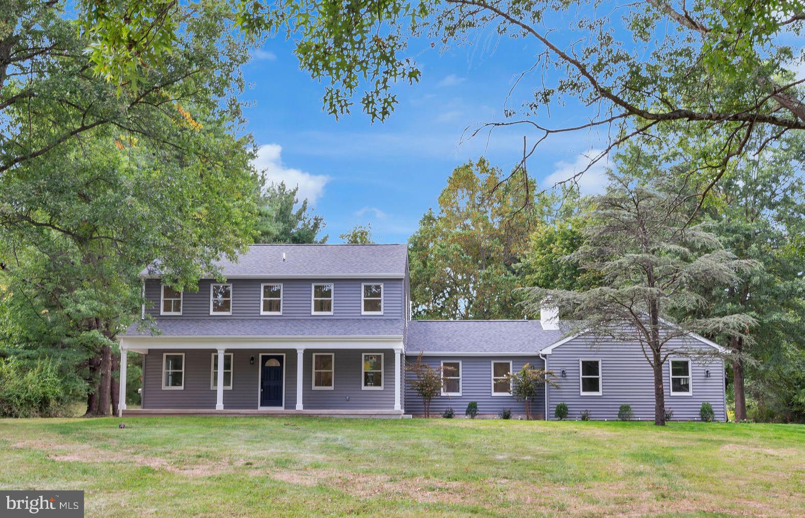 **Better than NEW**Set on an incredible 1.5 acre lot backing to picturesque meadows surrounded by mature landscaping, this classic Colonial sits tucked away in the heart of Solebury Township and has been completely renovated and shines with stunning updates throughout! **Brand New Roof, Siding/Gutters,, Windows and French Doors, Front Porch and Patios, Recessed Lighting, New Stainless Steel Appliances and LVP flooring throughout, Remodeled Bathrooms and Kitchen, New HVAC system, New Pressure Tank for well and passed septic system with Hydraulic Load Test!**Step inside from the welcoming covered front porch and discover gorgeous new flooring and a light-filled, open layout. A bright, modern and elegant eat-in Kitchen boasts crisp white cabinetry, gorgeous quartz countertops, stainless steel appliances, large pantry, and a stylish accent island-and opens to the spacious front to back Family Room with a cozy, stone fireplace and sweeping views. Formal Living and Dining Rooms are perfect for holidays and await memorable celebrations and intimate dinners with family and friends. Upstairs, a spacious Primary Suite is a true retreat with a walk-in closet and a brand new, luxurious bath featuring a walk-in shower and gorgeous finishes. 3 additional Bedrooms share a stunning, new Hall Bath with a tub/shower combo and bright, modern tilework. Step outside to an incredible backyard oasis with a brand-new patio and an expansive, park-like setting framed by mature trees- perfect for entertaining, outdoor games or unwinding in the beauty and tranquility of the seasons. The large unfinished basement, 2-car attached garage, and main floor laundry/mudroom provide everyday convenience, abundant storage and room for hobbies and future possibilities. All this in the award-winning New Hope–Solebury School District, just minutes to Peddler’s Village, downtown Doylestown, New Hope, and major routes for easy commute to New York City, New Jersey, and Philadelphia. Welcome to Corrigan Road!
