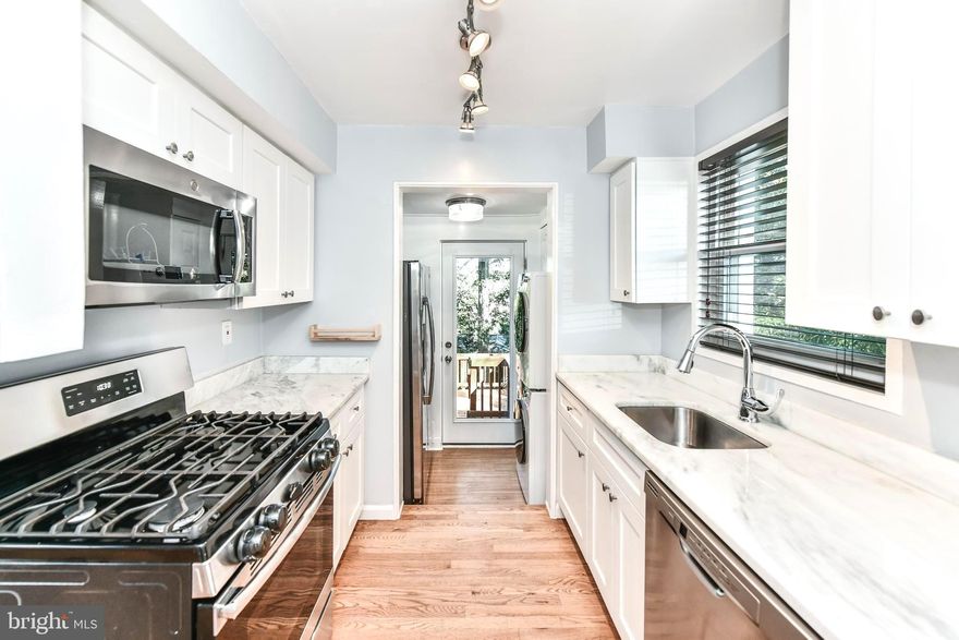 Welcome Home to this inviting 2BR Arlington Colonial in Columbia Forest!
Beautiful colonial with updated kitchen, featuring hardwood flooring on two levels, stainless steel appliances, granite and white 'shaker' cabinets. Large deck with a private backyard overlooking mature trees. 
*Lots of parks and walking trails including the Community Center*Great commuter location with bus access to metro stations & close proximities to D.C. & the Amazon center in Arlington & I-395*Near shops, entertainment & restaurants of Shirlington, Skyline & Columbia Pike*Arlington Schools!*No Cats*Owner willing to negotiate on price if tenants take over lawncare or for leases ending August/September 2026 or May/June 2027.*
*Lawncare Included in rent*