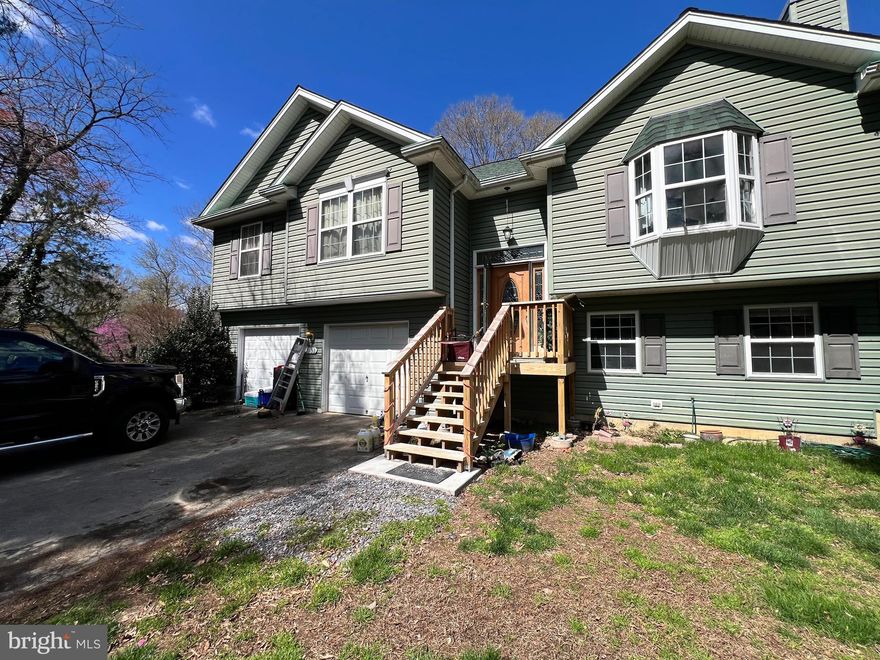 Investor and cash buyer special! Spacious split foyer in Waldorf featuring 4 bedrooms, 3 full baths, and a 2-car garage. Major updates already completed, including a newer roof and HVAC system. Conveniently located just off Route 228 with commuter access to National Harbor, Washington, DC, Northern Virginia, and Joint Base Andrews. Zoned for North Point High School. Home needs significant work, visible mold is present in the garage, and the property will not qualify for financing in its current condition. Priced to reflect condition and sold strictly as-is.