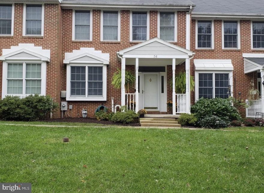 Welcome to 36 Iron Mill Garth, a warm and inviting 3-bedroom, 3.5-bath townhome located in the highly sought after Ashland community. This meticulously maintained home offers a perfect blend of comfort, space, and privacy.
A covered porch and tasteful landscaping greet you upon arrival. Step inside the bright and welcoming main level featuring a powder room and an eat-in kitchen with an abundance of cabinet space, stainless steel appliances and pantry. A separate dining area that flows into a spacious living room with a cozy gas fireplace is ideal for relaxing or entertaining. Just off the living area, enjoy seamless indoor-outdoor living with a private deck overlooking serene, tree-lined views. 
Upstairs, the large primary suite provides a true retreat with a generous walk-in closet and en-suite bath. Two additional bedrooms and a full hall bath complete the upper level.
The large, finished lower level expands your living space with a large recreation area, full bath, laundry, and ample storage, perfect for guests, a home office, or a family room. Walk out to the rear patio, offering another peaceful outdoor space backing to trees. And don’t miss the end-of-group 2 car garage.
With access to the NCR Trail right in the neighborhood and shopping, dining, and commuter routes close by, this home offers the space you need and the setting you’ll love.

Professional photos to be uploaded 4/14