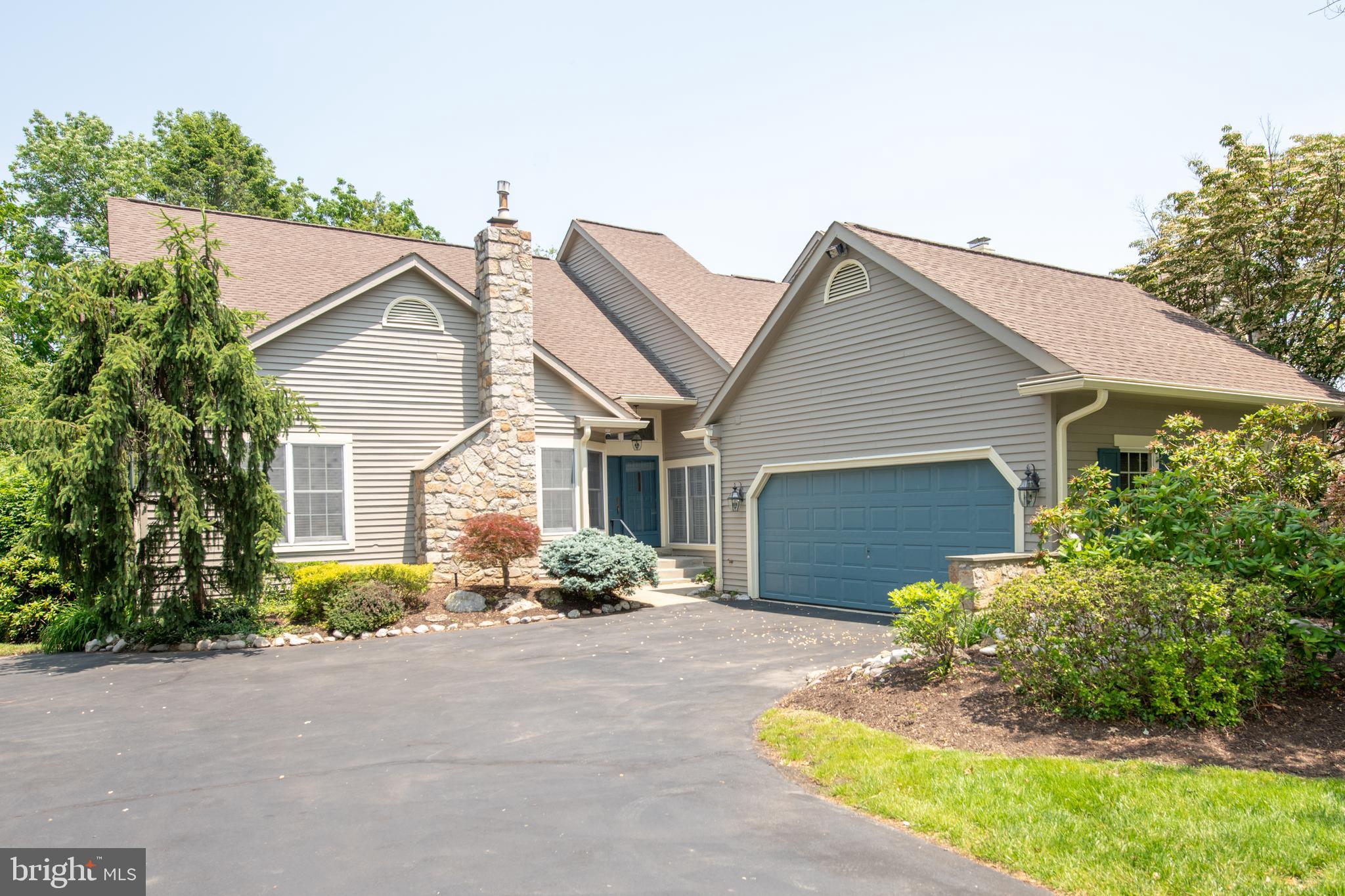 Welcome to Tall Trees, a tree lined private community of spacious contemporary carriage homes conveniently located in Huntingdon Valley and Abington township. This 3 bedroom, 3 & 1/2 bath plus loft home is nestled on a beautiful, quiet tree lined street. Enter this elegant home via the covered front entrance into a foyer and on to a 2 story great room with wood burning fireplace with marble surround and 2 doors to a covered deck overlooking the secluded wooded grounds, a wonderful place to enjoy your morning coffee or evening glass of wine. There is an adjacent formal dining room for all your holiday dinners. The eat-in kitchen has white cabinets, granite counter tops, tile backsplash, gas cooking, butlers pantry and separate pantry closet. This home features a completely renovated huge primary bedroom with luxury vinyl plank flooring, vaulted ceiling, recessed lights, walk-in closet and a door to your charming deck. The attached primary bath has also been completely renovated with custom tile, double sink vanity, built-in cabinets, large zero threshold stall shower, top of the line Toto toilet/bidet and linen closet. On this floor there are 2 additional bedrooms, one is being used as a den and has a wood burning fireplace with brick surround, the other is being used as an office. The hall bath has a double stall shower, vanity sink and a sauna. A convenient powder room and large laundry room with shelves and cabinets (washer & dryer included as is) complete the first floor. On the second floor there is a good sized loft/bedroom with walk-in closet and attached full bath with vanity sink and tub/shower. Additional features: completely finished, huge walk-out basement that includes a living area and game area with a pool table, (included as is),cedar closet and large storage area; 2 car oversized side garage with shelving and inside access: 2 HVAC units; located near the gorgeous Penny Pack walking trails and so much more!! Make your appointment today!!