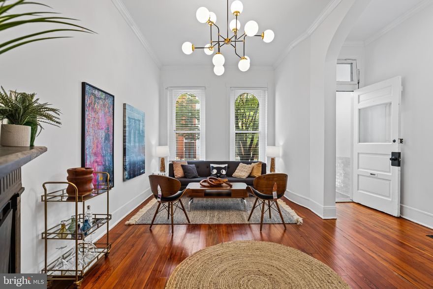 Parkviews at 1746 Park! See this 4 bedroom, 2.5 bath Brownstone in Bolton Hill — designer details perfectly coupled with classic architecture! Thoughtful updates, access to pocket parks, cafes, and Streets grocery store coming soon! The home has undergone a stunning designer renovation that thoughtfully preserves historic character while providing all the comforts of contemporary living. Spacious, light-filled bathrooms, a show-stopping kitchen, and fresh paint throughout make this a truly turnkey opportunity. Hidden Maple Leaf Park is directly behind the home, and includes additional parking spots. Upper level views to the front include Park Avenue’s fountains — offering rare green space in both directions. EXTRA STREET PARKING in the rear - see photos! 

Designer, designer, designer details! Freshness added giving this home a uniqueness with modern light fixtures, spot-on current color trends, new tiling, vanities, fixtures, hardware…you won’t need to pay extra to hire a designer to decorate this brownstone! 

Historic details include functioning pocket doors, transom windows, tall ceilings, and exposed brick in the kitchen. Natural light throughout, topped off with a bright skylight in the top-floor bathroom. Rare in older Bolton Hill homes, 1746 Park has plenty of storage including closets and a walkout basement with great ceiling height that could double as a gym. A walk-out roof area has potential for a roof top deck to overlook Maple Leaf Park. 

The location benefits from current and future investment, with a large-scale development underway just across North Avenue! Central to the cultural arts district, top restaurants, and Penn Station for NYC and DC access, this home mirrors art and design influences of a central city life. Neighbors spend time stooping, walking to nearby pocket parks, or larger community gatherings and pick-up games at Sumpter Park. Enjoy restaurants and cafes such as Llama’s Corner, Cookhouse, On the Hill, Brass Tap and Angeli’s, or nearby Station North which continues to thrive with Alma Cocina Latina, Foraged, Le Comptoir du Vin, The Royal Blue and mainstays such as Charles Theater and Tapas Teatro. Blocks from Mt. Vernon, BSO, The Lyric, I-83, Light Rail, Metro, and Penn Station. And COMING SOON Streets Market for a walkable grocery store!