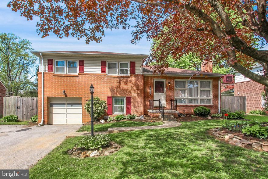 Very well maintained, 3 bedroom, brick, split level in York Suburban school district! Home features  large kitchen with island, dining area and patio access. New windows throughout and hardwood flooring in living room and bedrooms.  Lower level 1 includes family room with luxury vinyl and recessed lighting plus a newly refinished full bathroom. Additional rec room on lower level 2 along with laundry room. Attached 1 car garage. Large screened in patio and level fenced in yard perfect for summer entertaining. Play set stays! Don't miss it, this one is going to go fast!