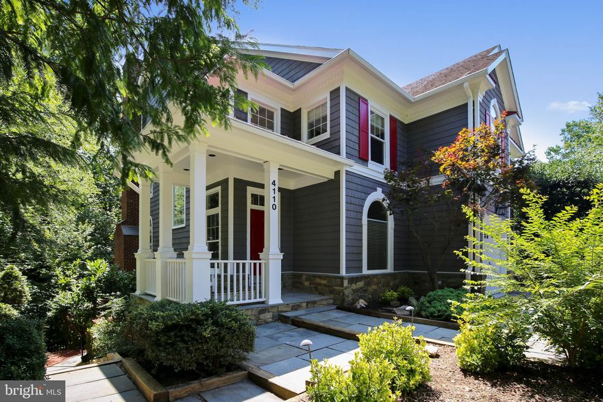 This elegant 5 bedroom, 4.5 bath Craftsman home nestled on a private wooded half acre lot has it all, a tailored exterior, 2 car garage and custom driveway, expert landscaping, the finest in architectural features and details, open floor plan designed for entertaining, high ceilings, decorative moldings, marble and hardwood flooring, 3 fireplaces, gourmet kitchen, luxurious owner's suite, an abundance of windows, expansive decks, patios, hot tub and so much more! Formal living room with fireplace, banquet sized formal dining room, library, chef's kitchen, two story family room with cathedral ceiling and floor to ceiling stone fireplace. The master bedroom suite boasts a deep tray ceiling, custom walk in closets, and a luxurious en suite bath with skylights, dual vanities topped in granite, vessel soaking tub, and frameless glass shower. Down the hall, a junior suite enjoys a private bath and two additional bright and spacious bedrooms share a well-appointed hall bath with a dual-sink vanity, while a bedroom level laundry room eases the daily task. Fine craftsmanship continues in the expansive lower level recreation room with an additional fireplace, and pub-style wet bar sure to be a popular destination for family and friends; while a 5th bedroom, additional full bath, and bonus/exercise room offer the versatile space to meet the demands of your lifestyle and complete the comfort and luxury of this wonderful home. All this in a peaceful setting that will make you feel miles away from the hustle and bustle, yet just minutes to the GW Parkway, Glebe Road, Metro, and Routes 29 and 50 and with easy access to Tyson's and DC. Enjoy Theodore Roosevelt Island's 91-acre wilderness preserve with miles of tranquil wooded nature trails along the historic Potomac River which also offers boating, fishing, and leisure activities. Experience all the myriad of benefits to living on the outskirts of the nation's capital  museums, theaters, stellar dining, diverse shopping, endless historical sites, the National Zoo, beautiful parkland, nightlife, and entertainment galore! For an unforgettable home in an unbeatable location, this is it!