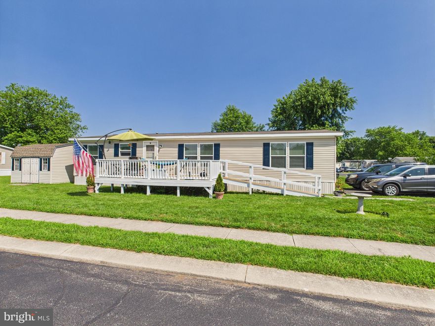 Step into this beautifully renovated 3-bedroom, 2-bath manufactured home, where modern comfort meets easy living in a peaceful community setting. The bright and open floor plan welcomes you with abundant natural light, perfect for both relaxing and entertaining. Enjoy the convenience of an office nook ideal for remote work or creative projects, while the spacious bedrooms provide comfort and privacy. Outside, a large shed offers ample storage space, the oversized front porch is the perfect place to hang out outdoors, and the quiet neighborhood creates a serene retreat you'll love coming home to. Schedule your showing today!