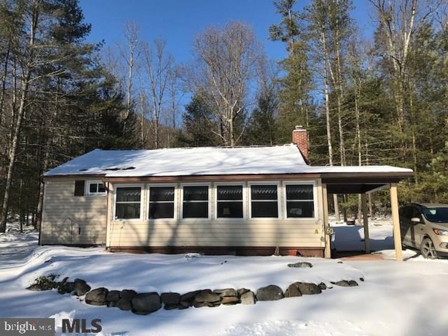 New Lancaster Valley Home or Hunting Camp on 2 acres next to State Game Lands. 2 Bedroom, 1 Bath, 1470 square feet. Wildfire galore, ceiling fans, heated sunroom, shed & outdoor fireplace, wood stove for secondary heat source. 3 miles on New Lancaster Valley Road. 30 miles from State College.