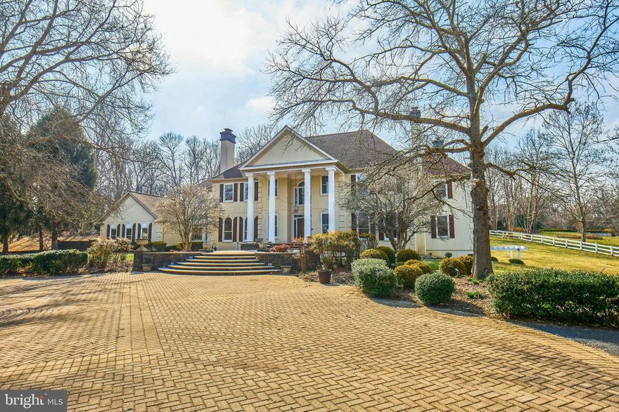 Gorgeous estate located in the highly sought after area of Clifton, featuring a gated entrance to a very private estate, elevator for all three levels and dance floor, full spa with a sauna and much more!  Luxury estate that offers a wonderful light and bright layout that offers full five acres of serenity and peace!  The main level offers a commanding foyer, a two-story family room, a sunroom and a library!  Upper level offers spacious bedrooms!  The master suite has private access to a balcony facing the rear, a large sitting room with a fireplace and bookcases built.  The master bath has dual vanities with a separate tub and shower and a private steam room with private access to the ELEVATOR!  The 2nd bedroom has an ensuite bath.  The 3rd bedroom has private access to the bath and hall access.  The lower level boasts a sauna, hot tub, waterfall shower and tub, game room, dance floor, media room, and game room!  The commanding layout that possesses luxurious amenities and is ideally situated behind private gates!   The lot presents a picturesque setting on 5 full acres, that offers a quaint pond for fishing or just enjoying outdoor entertainment.   There is plenty of room for a pool, outdoor kitchenette or a sports court.  
 HURRY!  This is truly a rare find!  Must see to appreciate!