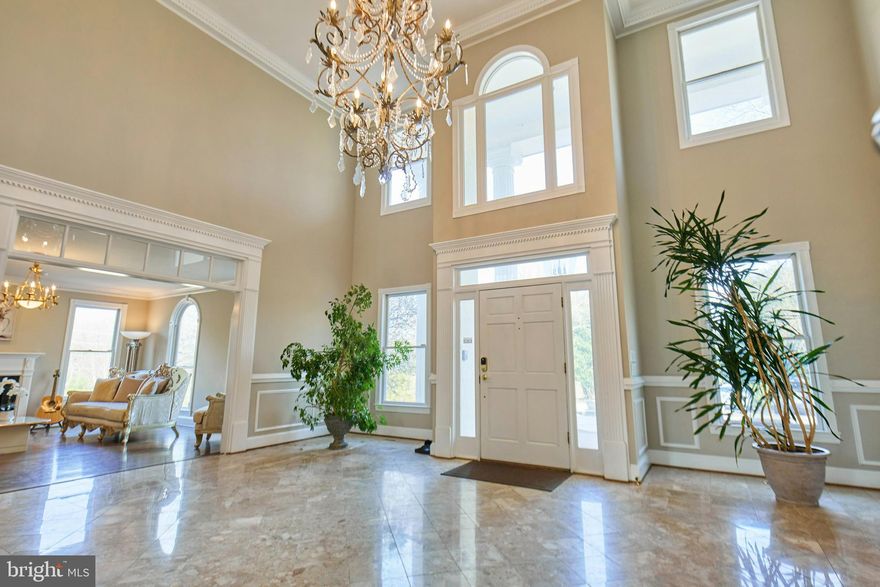 Gorgeous estate located in the highly sought after area of Clifton, featuring a gated entrance to a very private estate, elevator for all three levels and dance floor, full spa with a sauna and much more!  Luxury estate that offers a wonderful light and bright layout that offers full five acres of serenity and peace!  The main level offers a commanding foyer, a two-story family room, a sunroom and a library!  Upper level offers spacious bedrooms!  The master suite has private access to a balcony facing the rear, a large sitting room with a fireplace and bookcases built.  The master bath has dual vanities with a separate tub and shower and a private steam room with private access to the ELEVATOR!  The 2nd bedroom has an ensuite bath.  The 3rd bedroom has private access to the bath and hall access.  The lower level boasts a sauna, hot tub, waterfall shower and tub, game room, dance floor, media room, and game room!  The commanding layout that possesses luxurious amenities and is ideally situated behind private gates!   The lot presents a picturesque setting on 5 full acres, that offers a quaint pond for fishing or just enjoying outdoor entertainment.   There is plenty of room for a pool, outdoor kitchenette or a sports court.  
 HURRY!  This is truly a rare find!  Must see to appreciate!