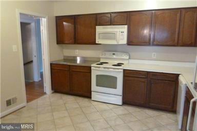 KINGS MANOR TOWNE HOUSES - Residential Lease