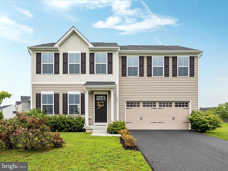 Welcome to 225 Norfolk Lane, located in the established Arcadia Springs community in Martinsburg, WV. This well-maintained 4-bedroom, 2.5-bath colonial was built in 2018 and offers a spacious layout with an attached 2-car garage.

The main level features a spacious family room, a beautiful kitchen with plentiful cabinets and a center island, a dining area, half bath, and a versatile den or hobby room. Ceiling fans throughout the home provide added comfort.

Upstairs features a large primary bedroom with an en suite bath including a dual vanity and walk-in closet. Three additional bedrooms, laundry room and a full hall bath complete the upper level.

The unfinished basement offers a blank canvas with a full bath rough-in, giving you the opportunity to complete the space exactly the way you want. Whether you envision a recreation room, home gym, guest suite, or additional living space, the possibilities are wide open.

This home sits on a flat corner lot in a cul-de-sac, providing both privacy and outdoor space to enjoy. Conveniently located just one mile from Route 9, five miles from I-81, and within easy reach of Martinsburg, Charles Town, and historic Shepherdstown.

Don’t miss the opportunity to make this one yours. Schedule your tour today.