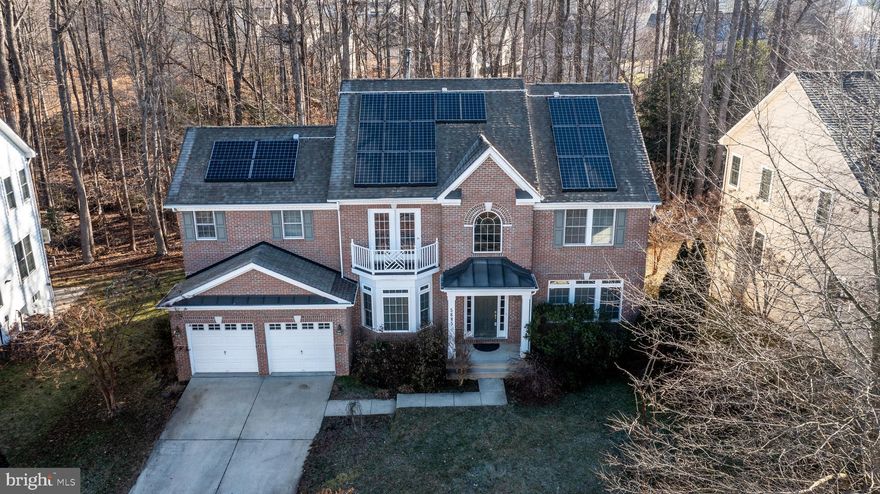 Welcome home! This beautifully well-maintained colonial-style home in Hunters Brooke delights with 4 bedrooms and 2.5 bathrooms. You are greeted with a well-lighted two-story foyer that boasts hardwood floors all the way to the spacious kitchen! This kitchen comes fully equipped for all of your entertaining needs; complete with a center island with gas cooktop, wall oven/ microwave combo, recessed lighting, and electronics station. Enjoy a nice breakfast in the breakfast area or relax in the family room with 9ft vaulted ceilings and a beautiful fireplace. Take a seat and chat in the spacious formal living room or dining room with many windows, gifting an abundance of natural light and elegant crown moldings. Walking upstairs from the beautiful two-story foyer, you are greeted by an open walkway. On the second level are four spacious bedrooms with decent-sized closets. Opposite the bedrooms comes your beautiful owner’s suite. This owner’s suite offers its own private balcony, large walk-in closet, additional linen closet, and a large owner's suite bathroom. The owner’s suite bathroom offers a standing shower, soaking tub, and double vanity. This home also offers a spacious office on the main level along with a laundry/mudroom. The basement provides plenty of space for working out and recreation. Come and see this lovely home, it won’t last long! Solar panels convey to buyer.