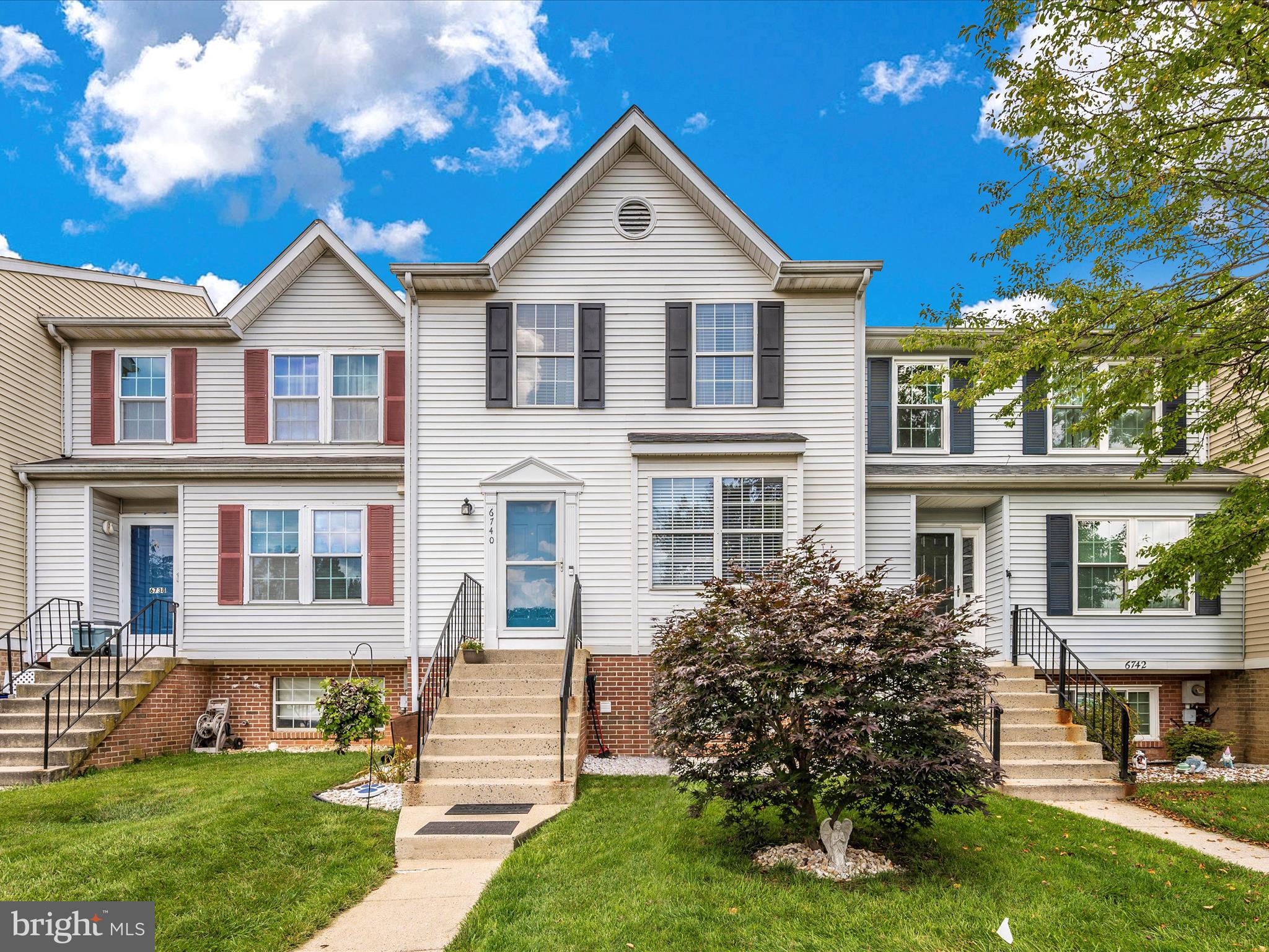 Make this spacious 3 Level townhome in the sought-after Robin Meadows Community your next home! The main level features Brazilian cherry hardwood flooring throughout the living and dining area, kitchen with stainless steel appliances, pantry and breakfast area. Half bath and sliding glass doors that open to the deck. Upstairs you will find three ample-sized bedrooms and two recently updated bathrooms, including the primary bedroom with an ensuite bath. The fully finished basement is perfect for a family room, rec area, or home gym and walks out to the fenced-in rear yard, laundry area with bath and plenty of storage. Enjoy the peace and tranquility of this charming neighborhood, 2 assigned parking spots, a community pool, basketball court, and much more! Conveniently located near restaurants, shopping, and commuter routes. Don't miss out on the opportunity to make this one yours!