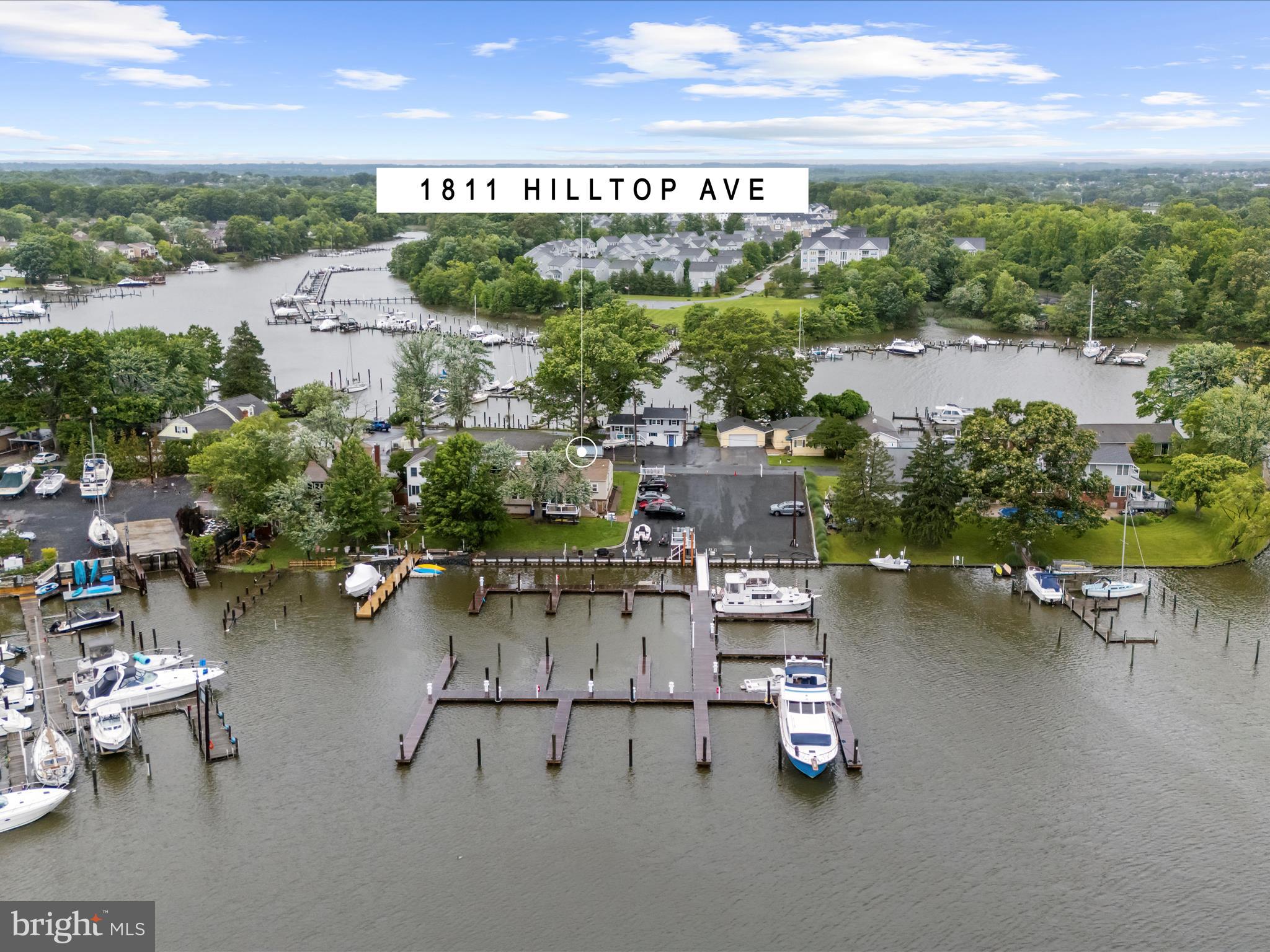 Discover your next venture with this exceptional opportunity to purchase a 22 slip marina which has been recently constructed with floating piers and 5 additional jet ski docks. This is a perfect opportunity for an owner/operator or an investor seeking a waterfront business. This hidden gem in located on the protected waters of Hopkins Creek just off of Middle River. The ranch style home on the property has been updated in recent years and features 3 bedrooms and 2.5 bathrooms. The lower level of this property has been designed as the bath house for the marina and has 2 half bathrooms and 2 separate showers- all updated! Ample parking for all. This is a rare chance to own a marina in this sought after location.