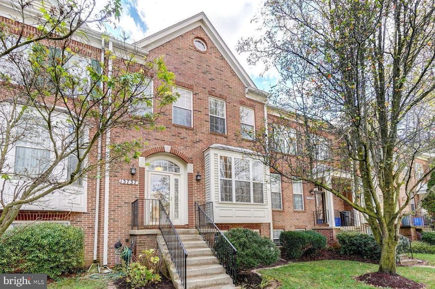 Gorgeous brick front home in the sought-after Willows of Potomac community. Over 2,400 square feet of living space on 3 finished levels, 4 bedrooms and 3.5 bathrooms! Gleaming wood floors throughout  the main level!  High ceilings, tons of natural light. Upon entry, you will see a wide open living room and dining room with beautiful moldings and wainscotting; The state-of -art eat-in kitchen features custom cabinetry, granite counters, and stainless-steel appliances. Off the kitchen is a cozy family room with access to a large back deck overlooking the community conservation area and lush tree line. Upstairs features 3 spacious bedrooms and 2 full bathrooms.  The primary bedroom suite features grand tray ceiling w/ceiling fan, walk-in closet, and picture windows overlooking the conservation area; Ensuite primary bath has soaking tub, double sink vanity, and walk-in glass and tile shower. The lower level is fully finished with a walk-out to your back patio, storage shed, yard, and community common grounds. The basement includes a huge rec room with cozy gas fireplace, separate laundry room; 4th bedroom and an upgraded full bath with an oversized walk-in glass and tile shower. Prime location: Large community playgroundright outside your front door,  2 Assigned parking spaces plus plenty of visitors parking spaces on the street, backing to conservation area, just minutes to major commuter routes and public transit. Community amenities also include a clubhouse, swimming pool, tennis and basketball courts! Available for July move in.