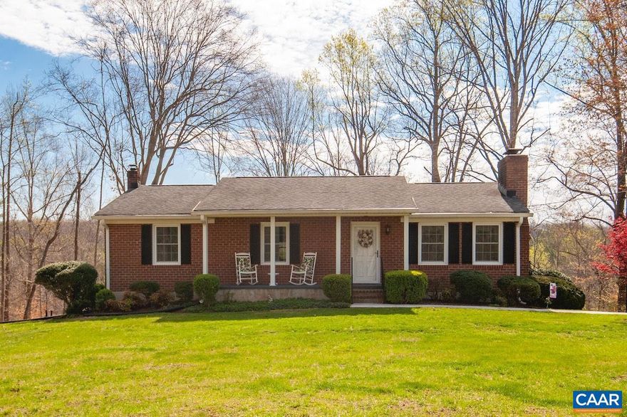 Incredible opportunity to own a well constructed and meticulously maintained home! Upon entry you can see how this house has been loved, maintained, and updated. Solid, brick ranch with full basement and ability to have a secondary living space ideal as an in-law or guest apartment OR place to gather extended family and friends. Walk-out basement has an eat-in kitchen, massive family room and/or recreation area with gas fireplace, full bathroom, and an optional 4th bedroom and/or bonus room for exercise or home office. First floor has a primary bedroom with attached half bath, 2 guest bedrooms, full bath, spacious living room with wood burning fireplace, and dining open to the renovated kitchen with breakfast bar, oak cabinets, tile backsplash, and updated appliances. Extras: Pella windows 2020, roof 2011, private back deck 2022, front porch, side entry, paved driveway, covered parking/carport, nearly level front yard with mature trees, backyard with storage sheds (rebuilt/roof 2020), mountain views, access to fiberoptic internet to work from home, easy commute to Charlottesville or Lynchburg. Only minutes to Lovingston town hub for groceries/dining, Nelson 151 wine and brew trail, orchards, outdoor recreation and more.,Oak Cabinets,Fireplace in Family Room,Fireplace in Living Room