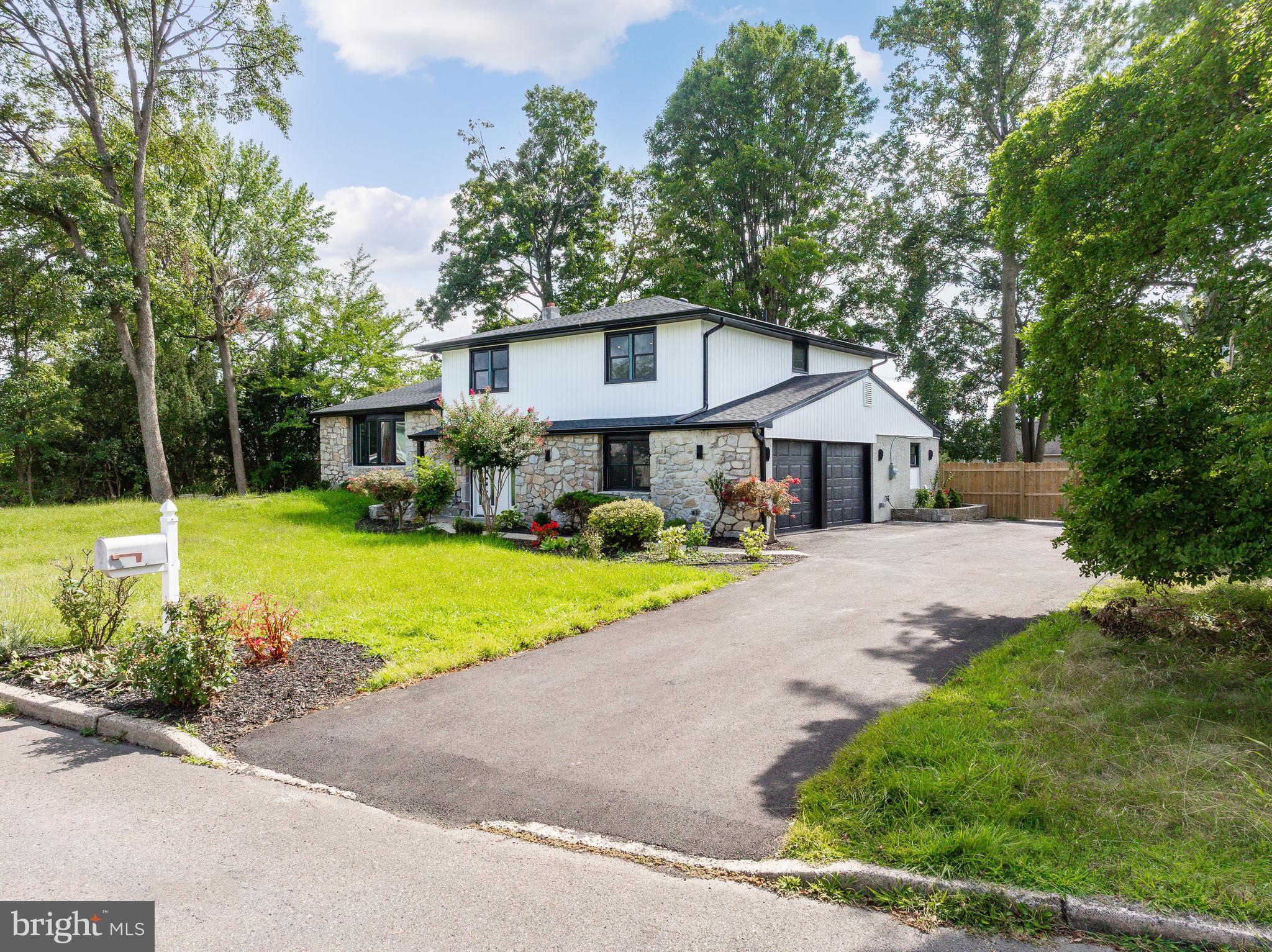 Welcome to this beautifully renovated modern retreat in the heart of desirable Huntingdon Valley! Situated on a spacious lot surrounded by mature trees, this stunning two-story home offers the perfect blend of style, space, and serenity.
🛏 4 Bedrooms | 🛁 2.5 Bathrooms | 🚗 2-Car Garage
Step inside to find a bright and airy interior featuring new wide-plank hardwood flooring, fresh neutral paint, and sleek black accents throughout. The open-concept living area flows seamlessly to the outdoors through large sliding glass doors, creating a perfect setup for entertaining or everyday living.
The gourmet kitchen, just a few steps up, overlooks the main living space and boasts modern finishes, stainless steel appliances, and a view of the beautifully landscaped backyard.
Retreat to the oversized bedrooms, including a luxurious primary suite with ample closet space and natural light. Each bathroom is tastefully updated with contemporary fixtures and designer finishes.
Outside, enjoy your morning coffee or evening gatherings in the private, fenced yard surrounded by lush greenery and manicured garden beds. The expanded asphalt driveway and attached two-car garage provide plenty of parking and convenience.
📍 Located in a peaceful residential neighborhood with access to top-rated schools, parks, shops, and just a short drive to Center City Philadelphia.