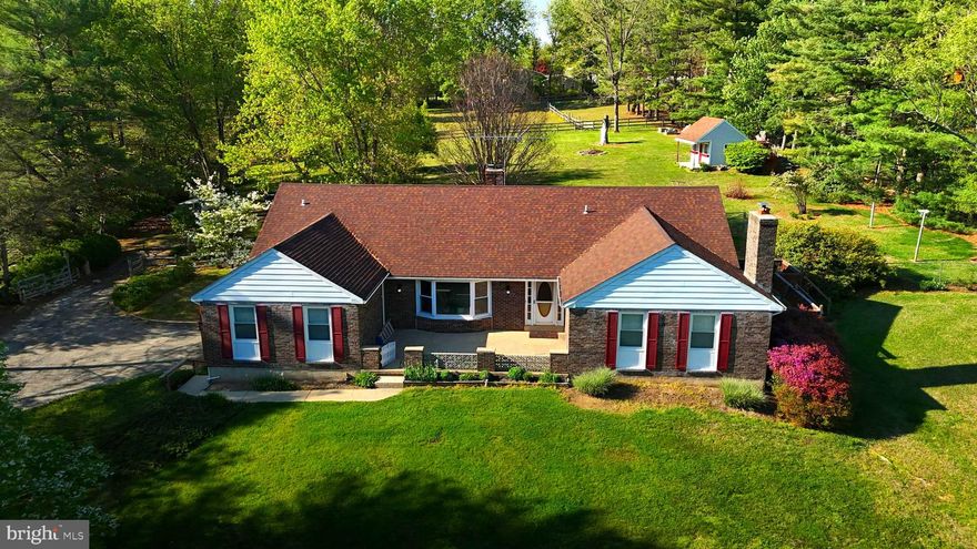 Welcome home to 169 Providence Road — a private 3-bedroom, 2-bath ranch retreat nestled on 3.29 beautifully open acres in the heart of Cecil County's most sought-after horse country. This is the kind of property that stops you the moment you arrive. No HOA, no crowded subdivision, no compromise — just wide open space, fresh air, and a setting that feels worlds away from the noise of everyday life while still being conveniently close to everything that matters.
Inside, the home offers over 2,500 square feet of thoughtfully laid out living space on the main level alone, plus a partially finished lower level that opens up endless possibilities for a rec room, home gym, workshop, or additional living quarters. Wood floors flow through the main living areas, and a second full kitchen adds tremendous versatility — ideal for canning, entertaining large gatherings, or accommodating multi-generational living with ease. The screened porch and deck off the kitchen are where this home truly shines, offering front-row seats to one of the most peaceful views you'll find in Cecil County — neighboring horses grazing lazily across the pasture while you sip your morning coffee. It's the kind of view you never take for granted.
The sellers have done the hard work so you don't have to. Every major system has been updated in recent years: roof replaced 5 years ago, windows replaced 5 years ago, HVAC updated 4 years ago, well tank replaced 5 years ago, and water heater replaced just 3 years ago. Move in with confidence knowing the big-ticket items are well behind you and years of worry-free living lie ahead. A side-entry 2-car garage, abundant storage throughout, and a layout that blends comfort with functionality make this home as practical as it is charming.
Step outside and the 3.29 acres invite you to make this property entirely your own — space for a garden, space for animals, space to simply breathe. The location is the crown jewel for equestrian enthusiasts and nature lovers alike. You're just minutes from Fair Hill Natural Resources Management Area, home to hundreds of miles of scenic trails and the world-renowned Maryland 5 Star, one of the most prestigious equestrian competitions in the country. Quick access to the Pennsylvania state line and the University of Delaware rounds out a location that truly delivers on all fronts.
Properties combining this much acreage, this many updates, horse country living, and a location this close to Fair Hill are rare finds in today's market. Come experience 169 Providence Road for yourself — and prepare to never want to leave.