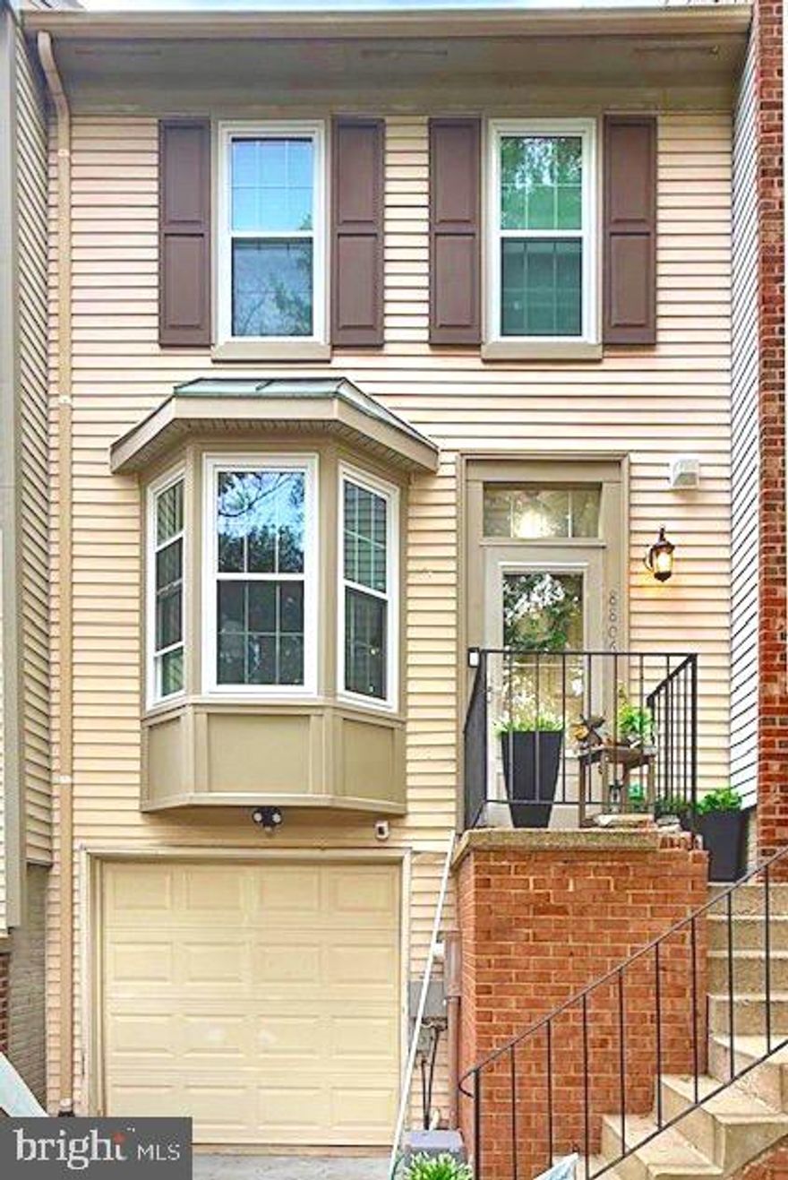 Discover where charm meets luxury.

This four-bedroom, three-and-one-half-bathroom townhouse, thoughtfully designed with luxury elements throughout. The open-concept main floor includes a living area with large bay windows that flood the space with natural light, accentuating custom details and finishes. The adjacent kitchen features stainless steel appliances, a central island, spacious countertops, and plenty of cabinetry for storage. Upstairs, each bedroom offers generous proportions, while the primary suite provides walk-in closets and an en-suite bathroom. The finished lower level, complete with a full bathroom, serves as versatile space for an additional bedroom, home office, recreation room, or guest suite. Step outside to the meticulously maintained backyard oasis—a serene private retreat perfect for unwinding and enjoying outdoor relaxation.