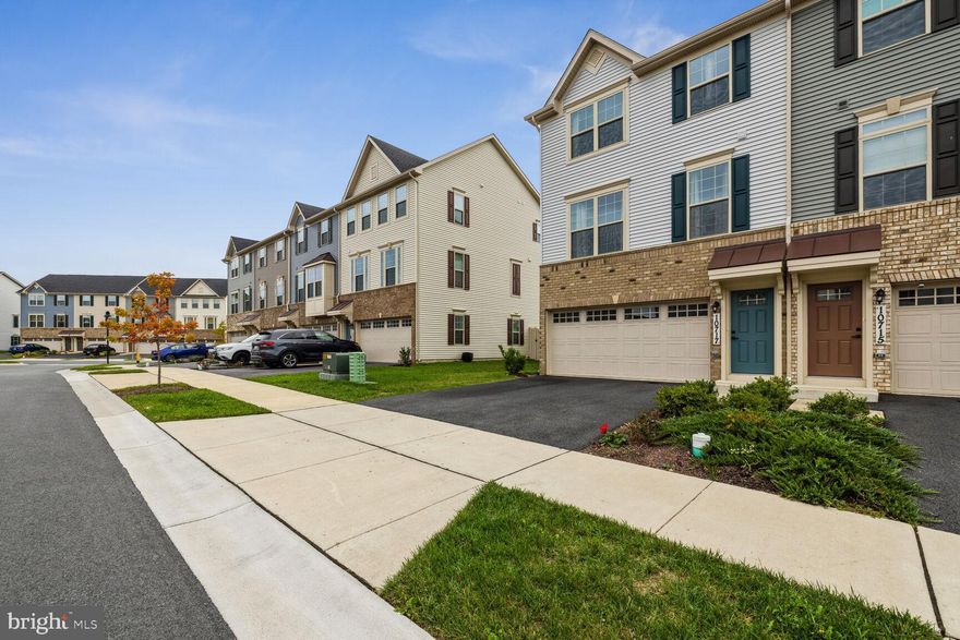 Nestled in the serenity of the Lake Linganore community - full of amazing amenities within desirable Frederick County - sits a stunning three-level townhouse that exudes charm and comfort. This end unit residence boasts three spacious bedrooms and two and a half baths, ideal for both relaxation and entertaining. The allure of this 2021 built home extends to its delightful features, including a gourmet kitchen and a deck that offers an idyllic space to unwind and enjoy the surrounding beauty. With a convenient two-car front-load garage, this property combines convenience with style. Its fully finished basement adds an extra layer of versatility, providing ample room for various activities or a cozy retreat. The inclusion of a tankless hot water heater and gas amenities underscores the thoughtful modernity woven into the property's design. Situated in desirable Lake Linganore, this home provides quick access to downtown Frederick and major commuter routes, making it an ideal retreat while still ensuring easy connectivity to the city's offerings. When you live in Lake Linganore you'll enjoy amenities such as swimming pools, tennis, pickle ball, fishing, hiking/biking trails, dog parks and more.  Don't miss Wegman's and national retailers close by.  Newly constructed Blue Heron Elementary is just steps away!