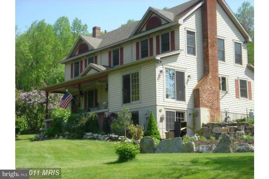 Private 128 Acre estate features a restored turn-of-the century home, detached office/artist's studio, multiple steel buildings/workshops. Swimming pond with dock and diving platform. Great location for a retreat, equestrian activity or landscaping contractor. Subdivision potential, Zoned RC with 10 acre lot minimun. Forrest Management Plan estimates over $340,000 in stumpage (timber) value and/or Ag Preservation programs available. 

Property includes:(1)A large detached hardwood siding office with two rooms plus a loft and a 10x34 utility shop, (2)A two Bay(w/12x12 Doors)36x35 Machine Shop/w HVAC plus 36x29 storage and 64x20 Lean-To(3)A 28x56 hay barn(4)A 78x20 machine shed(5)A two stall run-in-shed with electric and approx. 4 acres of fence(6)A detached 4 car garage with electric.

Potential Owner Financing with 25% -30% down with and competitive interest rate. 

These photos are 10 years old prior to properety being rented. Some TLC is needed and Owner is willing to work with Buyer.