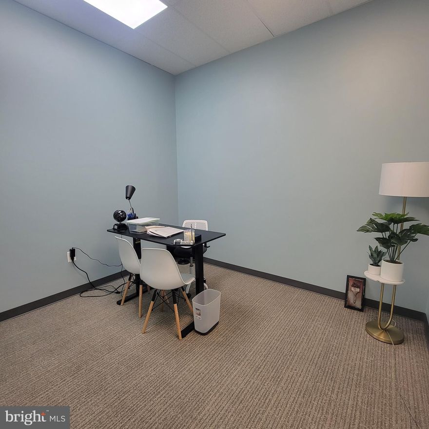 Great opportunity to rent mid-size private office in larger busy real estate office (nearly 2,000 square feet) in busy shopping center. Rent includes furniture, use of conference rooms during weekdays, internet, electricity, and kitchenette. Ideal for professional business (i.e. administrative, therapy, notary, clerk). Short-term lease (6 months) available for initial term, up to 12 months available at renewal.