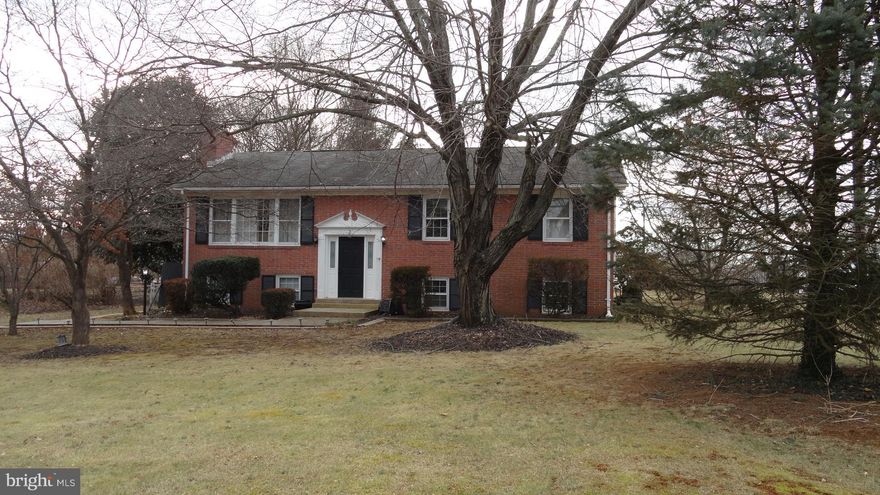 GREAT outdoor LIVING SPACE.  PRIVATE with mature trees---FENCED backyard, PATIO, PERGOLA,  FIRE PIT, DECK.  Inside features Hardwood Floors, 3 Bedrooms on the Main Level,  2 Bedrooms on the LL with a Full Bath.  All Bedrooms are nicely sized.  Spacious Family Room with Brick Fireplace.  Plenty of STORAGE SPACE.  Detached 2 car garage in the back