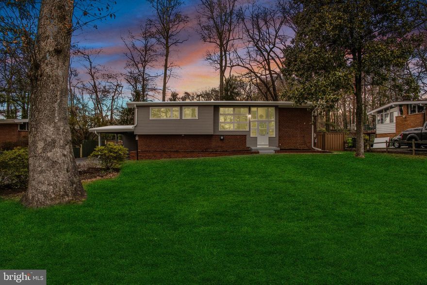 Beautifully renovated 4 bedrooms, 3 bath home. 2 finished bonus rooms in basement. Brand new kitchen with stainless steel appliances, tile backsplash and quartz countertops. Large deck. Updated bathrooms, new flooring and  fresh paint. Recent windows, roof and siding. Owner is licensed Realtor. Buyer to verify all square footage and measurements.