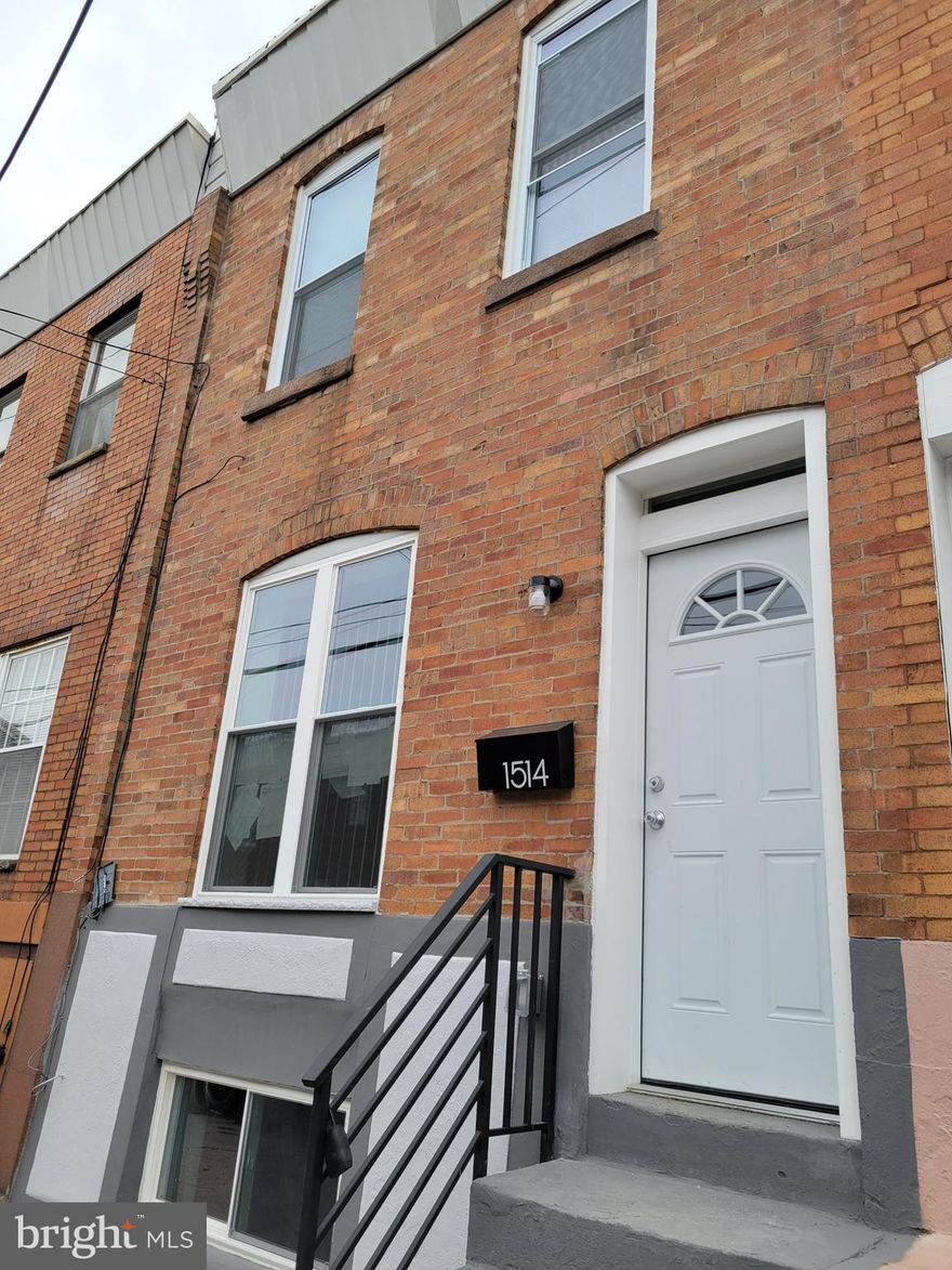 Welcome to 1514 S. 27th Street, Philadelphia, PA 19148! This newly renovated 3-bedroom, 1-bath home offers modern comfort and style with a brand-new roof, new windows, and a spacious, clean kitchen featuring stainless steel appliances and sleek Quartz countertops. A convenient mud room is located just off the kitchen, leading directly to the large private yard — perfect for outdoor living. The property also includes a full basement with washer and dryer for added convenience. A rare find in South Philly, move-in ready and designed for easy living! Great addition to one's real estate profile, Or perfect starter home.