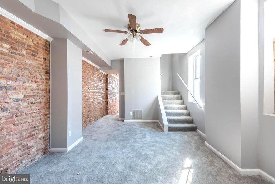 PRICED TO SELL!  Features include a spacious living room and dining area with exposed brick, a kitchen with ample cabinet space, upper level with 3 generously sized bedrooms and 1 full bath, a full basement with storage space and laundry area, and a private rear yard.  Property is being sold As-Is.  Cash, Hard Money, 203K only.  Convenient to downtown Baltimore, UMMC, stadiums, and major roadways!