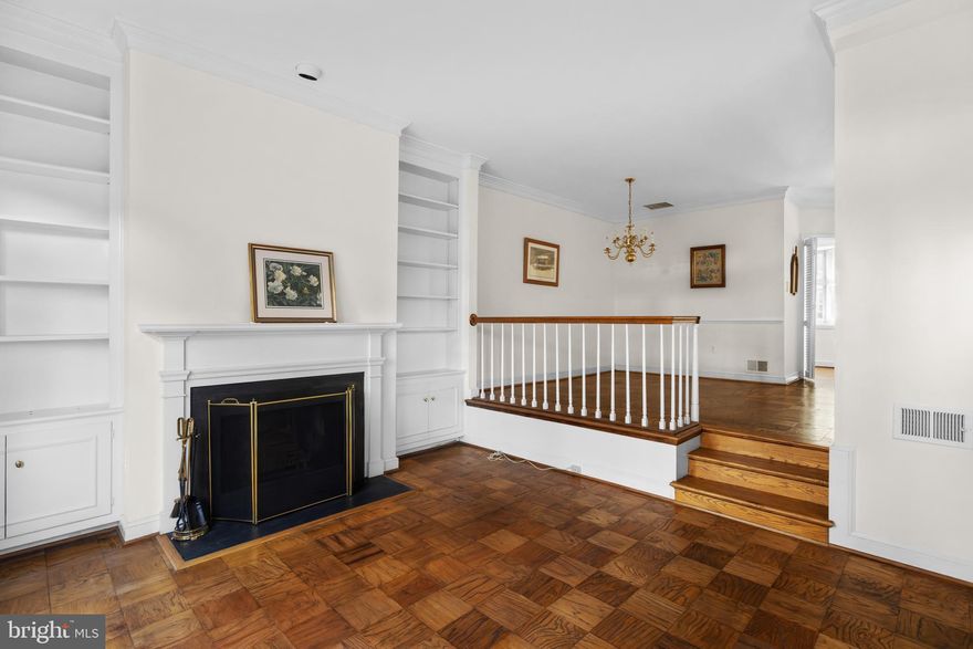 Welcome to this beautifully maintained end-unit brick home, perfectly blending classic and modern conveniences. The ideal location offers a short walk to the Metro and the incredible convenience of off-street parking. Inside, you'll discover a thoughtfully designed layout: Main Level: Enter into a warm space with gleaming hardwood floors. The kitchen has ample storage and counter space great for entertaining. The dining area features a charming step-down into the spacious family room, creating a distinct yet open flow. This cozy room is anchored by a fireplace and looks out onto your private patio and garden. An added Convenient powder room on the main level is perfect for guests. Second Floor: The upper level is dedicated to rest and relaxation, featuring two spacious bedrooms and two full bathrooms. The convenience of an upper-level laundry completes this floor. Third Floor Flex Space: The top level offers a fantastic, large bonus room. This versatile space is perfect for a home office, a playroom, a spacious primary suite retreat, or a guest room—the possibilities are endless. Summary of Key Features: End-Unit with Extra Light & Privacy, Off-Street Parking, Walk to Metro, Hardwood Floors & Cozy Fireplace, Fantastic Kitchen, Family and Dining Rooms, Private Patio/Garden, Main-Level Powder Room, 2 Bedrooms, 2 Full Baths, 2nd-Floor Laundry, 3rd-Floor Bonus Flex Room. This move-in ready home offers the perfect combination of urban convenience and private outdoor space. Don't miss this rare opportunity! UPDATES AND REPAIRS. NEW HOT WATER HEATER 2019, WINDOW RESTORATION AND EXTERIOR PAINTING 2018, NEW HVAC 2010, NE WHVAC MOTOR 2019, 2 UPSTAIRS BATHROOM UPDATES 2019, NEW REGRIGERATOR 2019.