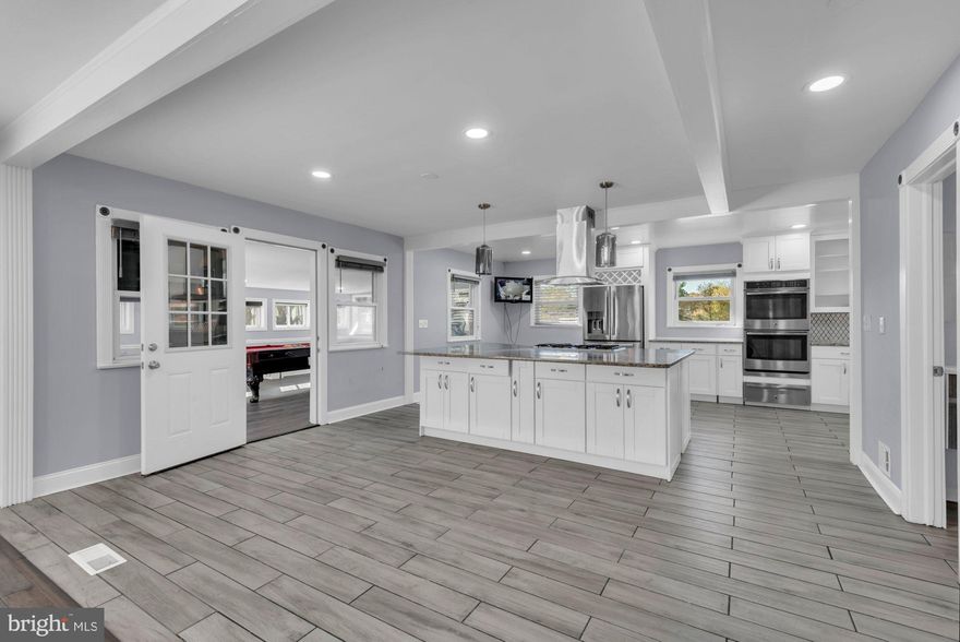 Are you ready to live in a Luxury Single-Family Retreat on 4 Acres with Multi-Generational Living??? Welcome to 4201 Enterprise Rd, Bowie Md 20720!
Discover unparalleled OPPULENCE and VERSATILITY with this expansive 4,500+ sq. ft. home, designed for modern living and ideal for large or multi-generational families. Nestled on nearly 4 acres of picturesque land, this completely remodeled home features 6 spacious bedrooms and 5 bathrooms, offering both comfort and sophistication throughout.
**Distinctive Highlights  Include**

- DUAL Primary Suites: TWO PRIMARY BEDROOMS, each with lavish ensuite bathrooms, that will ensure comfort and privacy for multiple generations or guests. Don't forget to check out the MIND BLOWING CALIFORNIA CLOSET found within one of the primary bedrooms!!!

- **MULTI-GENERATIONAL Living at its Finest:
 The property includes: TWO FULLY equipped KITCHENS on separate levels providing seamless living arrangements for all your family or extended families needs . The home also comes equipped with TWO sets of  washers and dryers for convenience and ease!

- Outdoor Recreation & Relaxation:
The home boasts a PAVED BASKETBALL COURT, perfect for sports enthusiasts, and a COVERED porch/game room for serene or exciting outdoor moments.

- Entertainer's Dream:
Host unforgettable gatherings on the expansive upper-level deck, offering ample space and stunning views.

-Never worry about PARKING at this home! AMPLE  (12+) parking spaces abound for all your favorite gatherings and get togethers!

Experience the perfect blend of elegance, comfort, and outdoor adventure in this meticulously designed residence, where every detail has been thoughtfully curated to offer a luxurious living experience.

**PLEASE READ** There is a fenced in pool located on the properties premises. The pool is INOPERABLE and is NOT to be UTILIZED for any reason. DO NOT enter the fenced in pool area.

*** There is a non-refundable Pet Fee of $250.00/pet as well as a $50.00 monthly  pet fee/pet (in addition to the monthly rents)

****If  you do not have an agent the home  will be shown various evenings per week by the listing agent ****

**** See documents for how to apply