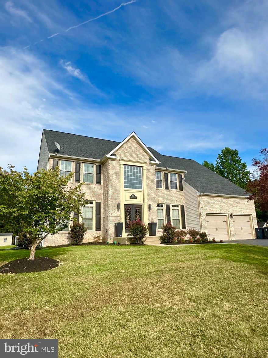 This beautiful colonial style home offers an ideal blend of comfort and functionality.  This inviting residence features a spacious main level, showcasing a formal living room, elegant dining room, and a dedicated office, ideal for remote work. The open family room, complete with a cozy fireplace, flows effortlessly into the modern kitchen, equipped with a gas cooktop, wall oven, and microwave. Enjoy meals in the sun-filled sunroom off the kitchen.

Upstairs, discover four generous bedrooms and two full bathrooms. The main bedroom boasts a large sitting area with its own fireplace and an expansive walk-in closet. The fully finished basement offers additional living space, complete with a full bathroom and direct access to the rear yard.

Set on a generous .69-acre lot of mostly flat land, this home features a vast rear yard, perfect for outdoor activities and entertaining. The property includes a two-car garage and a driveway accommodating up to four vehicles. Additional highlights include an outdoor sprinkler system and a septic grinder connected to public sewage. With a new roof installed less than five years ago, this home is ready for your personal touch. Don't miss this opportunity to own a beautiful home in a desirable location!