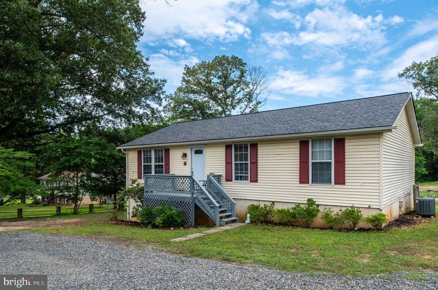 Charm and Location!  Enjoy Peace and Tranquility on Your Over One Acre Lot.  Entertain in the Large Living Room and Kitchen.  Plenty of Space Outdoors to Entertain Too!  Large Primary Bedroom and 2nd Additional Bedrooms and a 2nd Full Bath on the Main Level.  The Lower Level offers a Huge 4th Bedroom, Recreation Room and Full Bath.  Deck Overlooks the Beautiful Scenery in the Back Yard.   Fresh Paint, Roof is just 4 Years Old, New Carpet.  Nice Neighborhood Living with NO HOA!
Close to Quantico, Northern VA and Aquia Creek.  4th Bedroom NTC due to 3 Bedroom Perc.