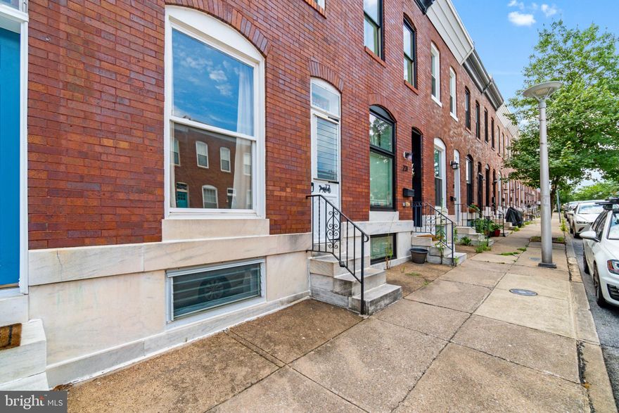 Walk to Patterson Park! Parking pad in Rear.  Property features 3 bedrooms (1 pass thru), basement finished as recreation room, large main level w/ true living room and dining room, large eat-in kitchen, great storage, good natural lighting and more!