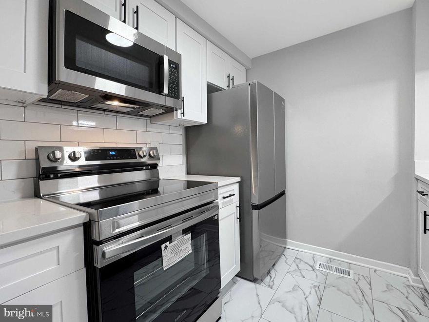 AMAZING NEW PRICE!! GREAT INVESTMENT!! This fully updated two-level 1BR/1BA condo is truly turnkey and ready for immediate move-in or rental. The main level features a bright living room, dining area, and renovated kitchen with quartz countertops, new white shaker cabinets, a subway tile backsplash, and new stainless steel appliances—plus a convenient breakfast bar that opens to the living/dining area. Enjoy bamboo wood floors, fresh neutral paint, and new recessed lighting throughout.

The lower level offers a spacious primary bedroom with generous closet space and a sliding glass door that opens to your private patio—perfect for morning coffee or unwinding at the end of the day. The beautifully updated full bath includes a modern vanity and stylish finishes. A dedicated laundry area is located on the lower level. Updates include the washer and dryer (2022), HVAC system (2022), and water heater (2021). 

Community amenities include an outdoor pool, tennis courts, and playgrounds. Conveniently located just minutes to I-270, public transportation, and nearby shopping and dining. Sold As-Is.