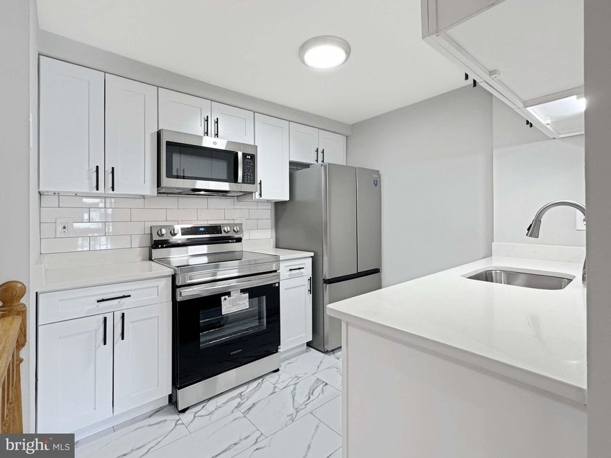 AMAZING NEW PRICE!! GREAT INVESTMENT!! This fully updated two-level 1BR/1BA condo is truly turnkey and ready for immediate move-in or rental. The main level features a bright living room, dining area, and renovated kitchen with quartz countertops, new white shaker cabinets, a subway tile backsplash, and new stainless steel appliances—plus a convenient breakfast bar that opens to the living/dining area. Enjoy bamboo wood floors, fresh neutral paint, and new recessed lighting throughout.

The lower level offers a spacious primary bedroom with generous closet space and a sliding glass door that opens to your private patio—perfect for morning coffee or unwinding at the end of the day. The beautifully updated full bath includes a modern vanity and stylish finishes. A dedicated laundry area is located on the lower level. Updates include the washer and dryer (2022), HVAC system (2022), and water heater (2021). 

Community amenities include an outdoor pool, tennis courts, and playgrounds. Conveniently located just minutes to I-270, public transportation, and nearby shopping and dining. Sold As-Is.