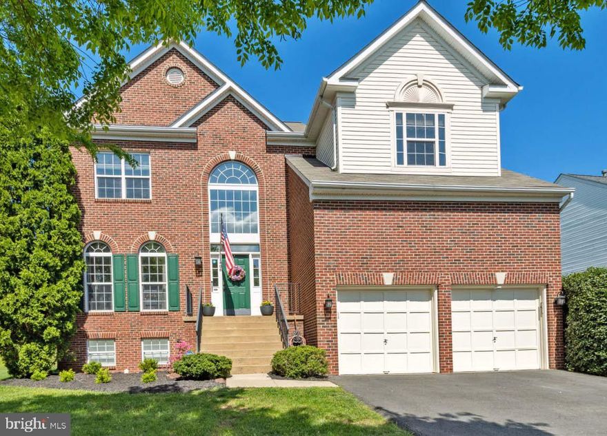 Stunning single family home in Potomac Crossing, Leesburg, VA.  Built in 2000, this home is loaded with upgrades.  Fully renovated kitchen, master bathroom, 2 story stone fireplace.  Laundry room located on bedroom level (upper level).  Large tranquil backyard with plenty of room for the entire family to enjoy.  Situated in a family friendly neighborhood, within walking distance to Balls Bluff Elementary School.  Convenient to restaurants, shopping and Historic Downtown Leesburg.  Open concept kitchen and family room.  Hardwood floors throughout the entire main level.  A cooks dream kitchen featuring Sub Zero, Wolf and Viking appliances.  Fully finished lower level including a bar and fully equipped media room.  Perfect for entertaining! Updated master bathroom with large walk in shower. Oversized garage, almost 2 story height, could possibly fit a lift or extra storage system.  Many items can covey.  Theater Chairs convey.  New roof late fall 2019. 2021 HVAC unit, 2019 Water heater.  Closet built ins. Whole house freshly painted 2024.  Don’t miss this opportunity to live in a sought after community!